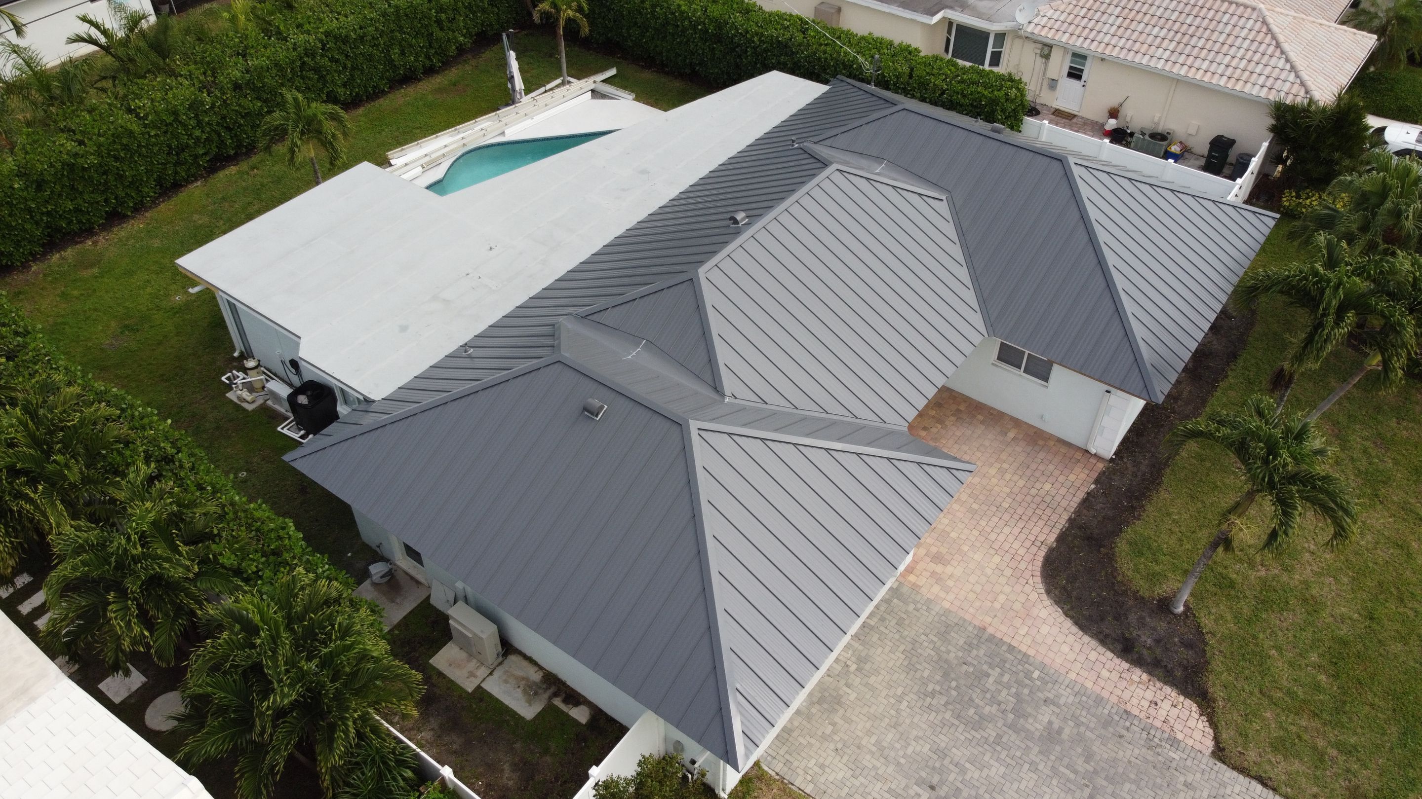 Residential Roofing Installation using 1" Nail strip metal roof by BLUES BROTHERS ROOFING