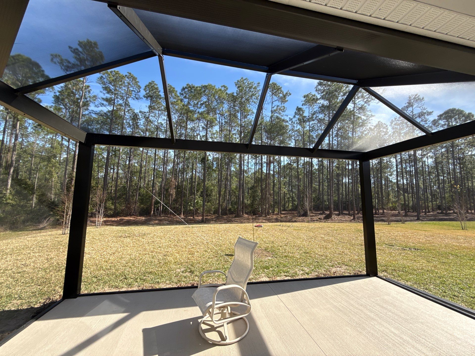Gable screen enclosure w/ultraview + concrete by Courtesy screening