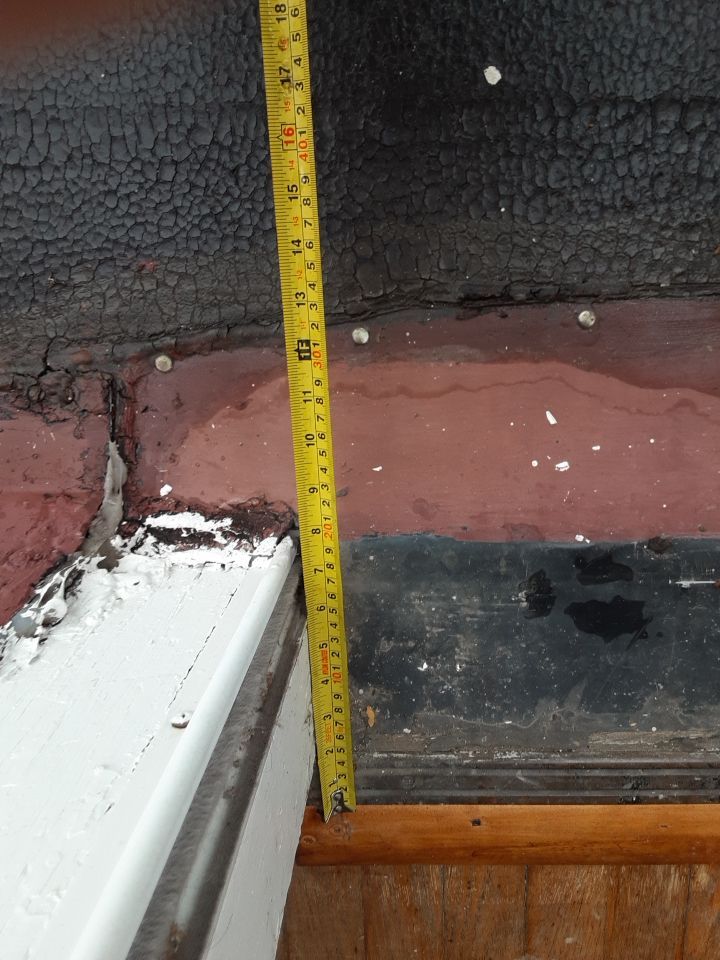 Residential Roof Replacement using Patio Roof by Absolute Roofing and Construction
