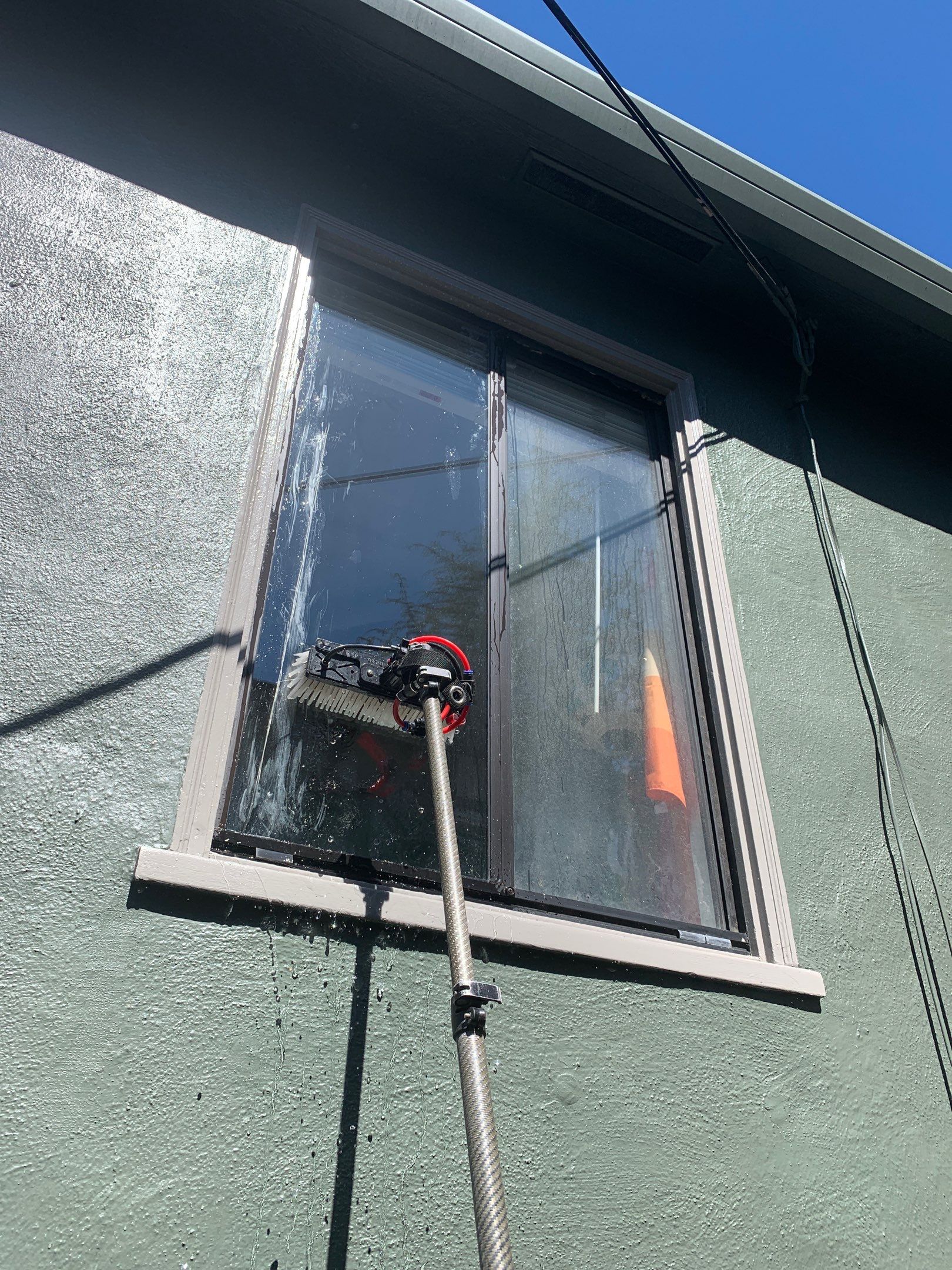 Exterior window cleaning using Pure Water Wash by SpotFree Window Cleaning