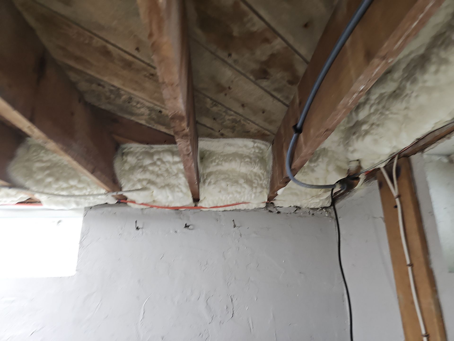 Attic Insulation using open cell spray foam by NYS Foam & Energy