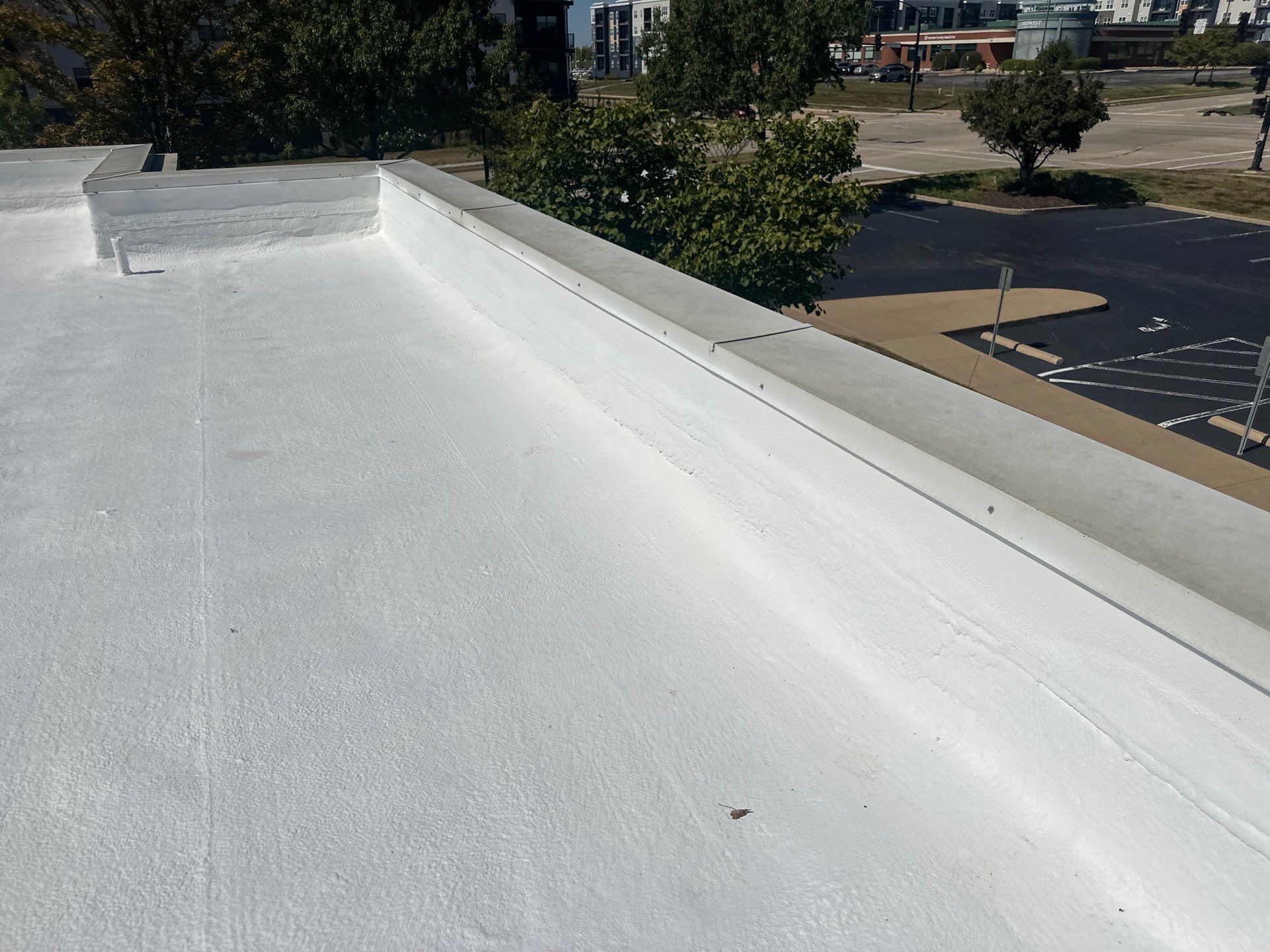 Commercial Roofing Install - SPF Foam & Coatings Restoration & EPDM System - Color White  by Titan Commercial & Residential Roofing 