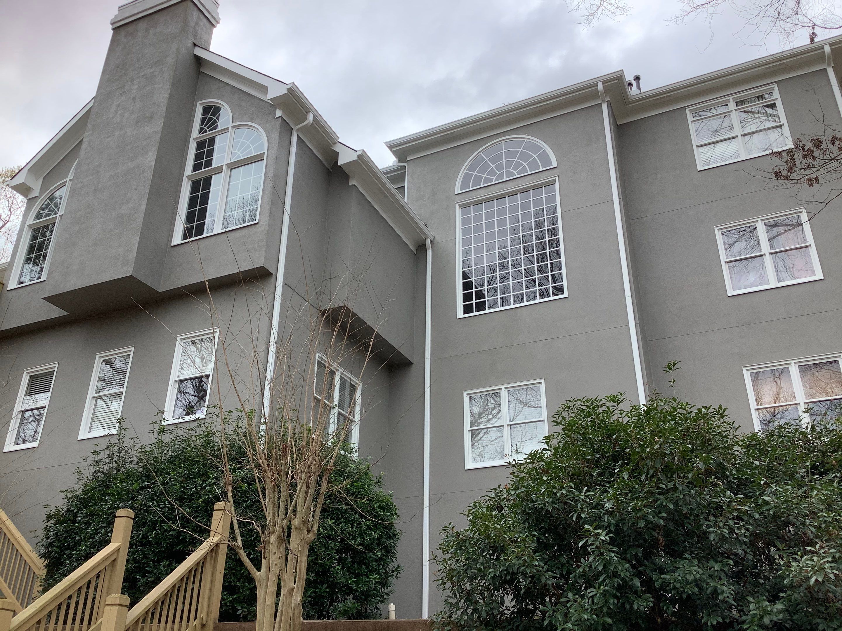 Exterior Stucco Painting and White Trim Update in Roswell by Swift Home Renovations