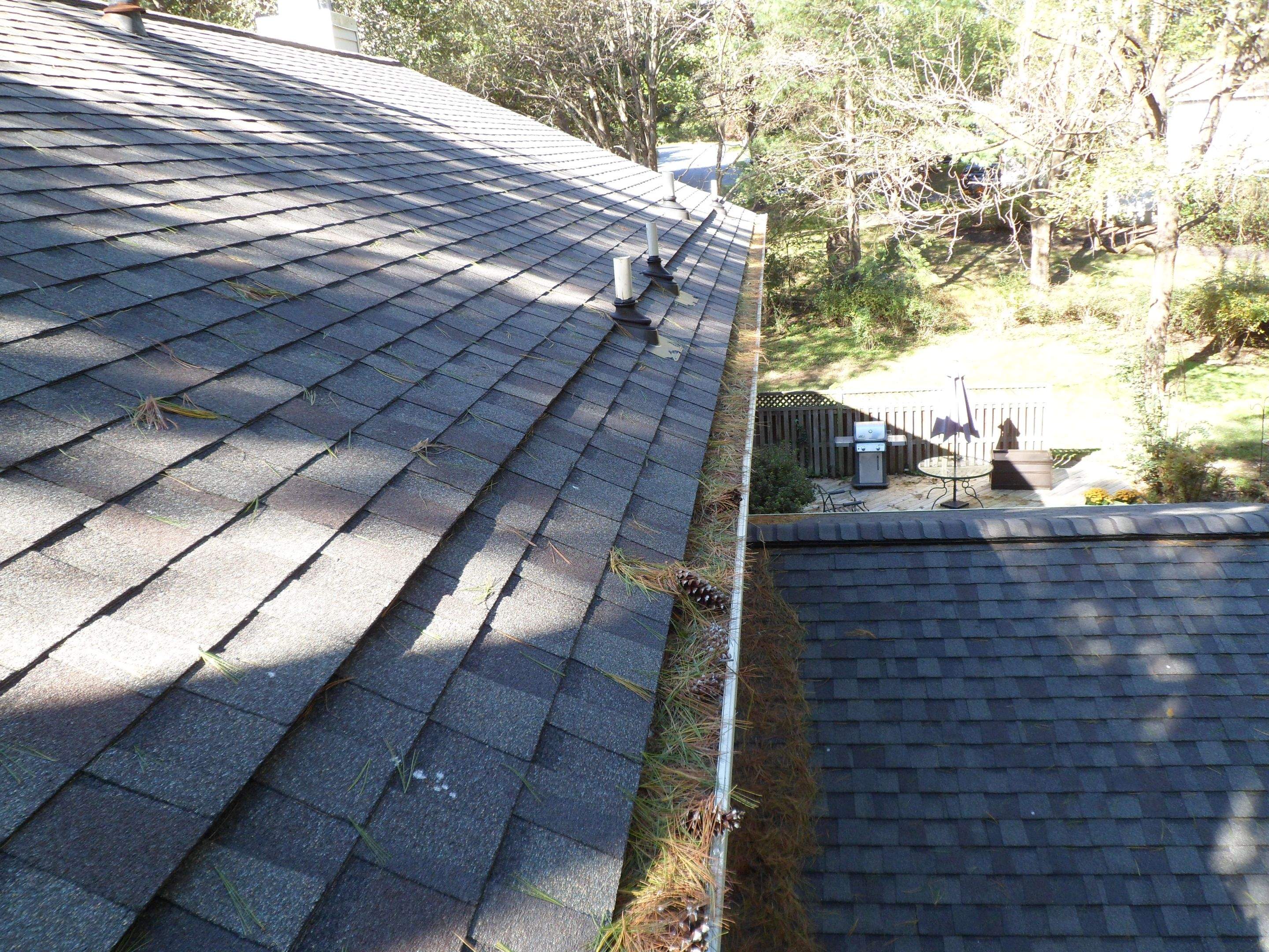 Residential Roofing Installation using Landmark Shingles Color Weatherwood by Alpha Design Services
