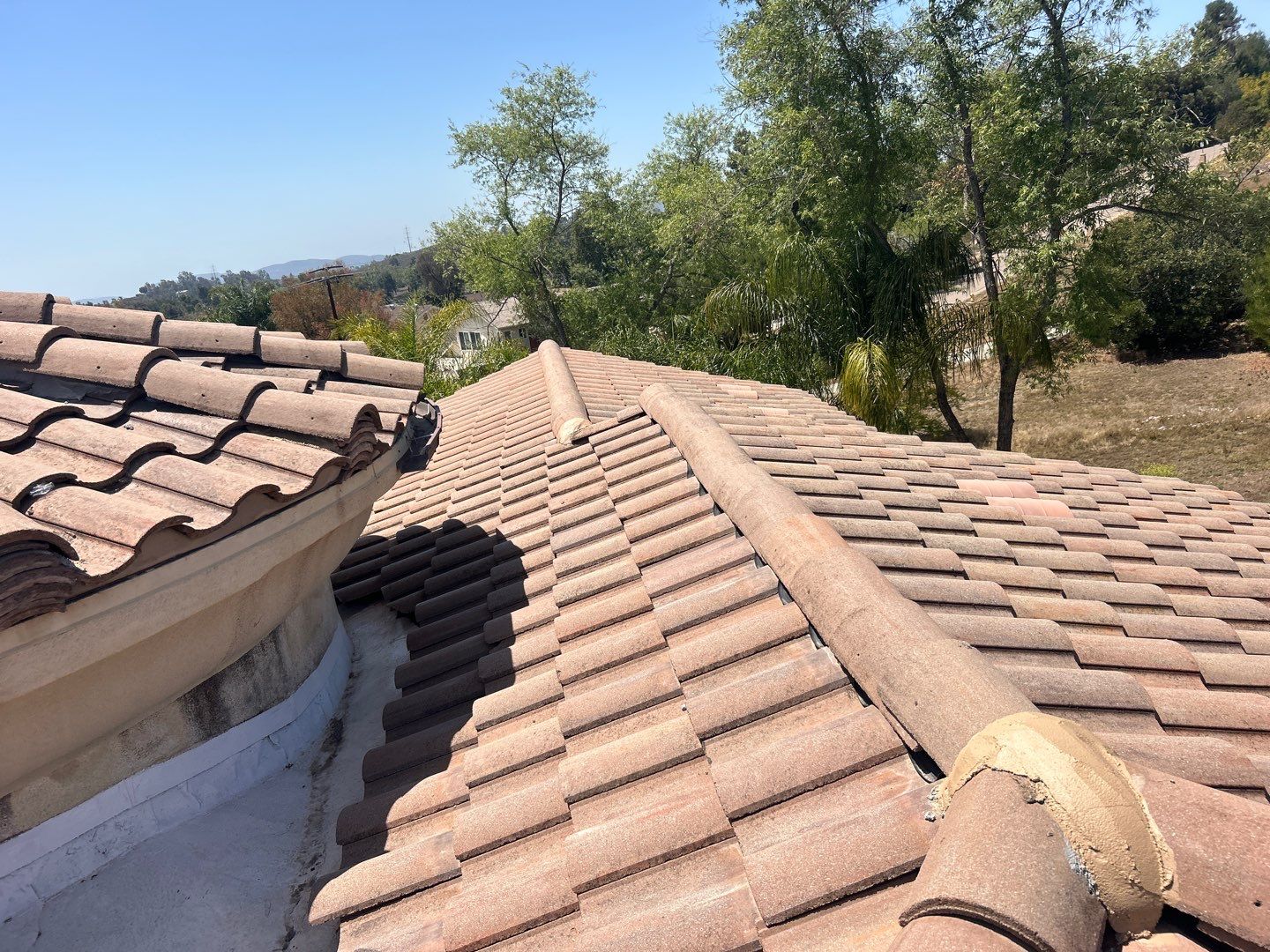 Terracotta Tile Roof Repair and Ridge Cap Sealing in Escondido by Reliable Roofing San Diego Inc.
