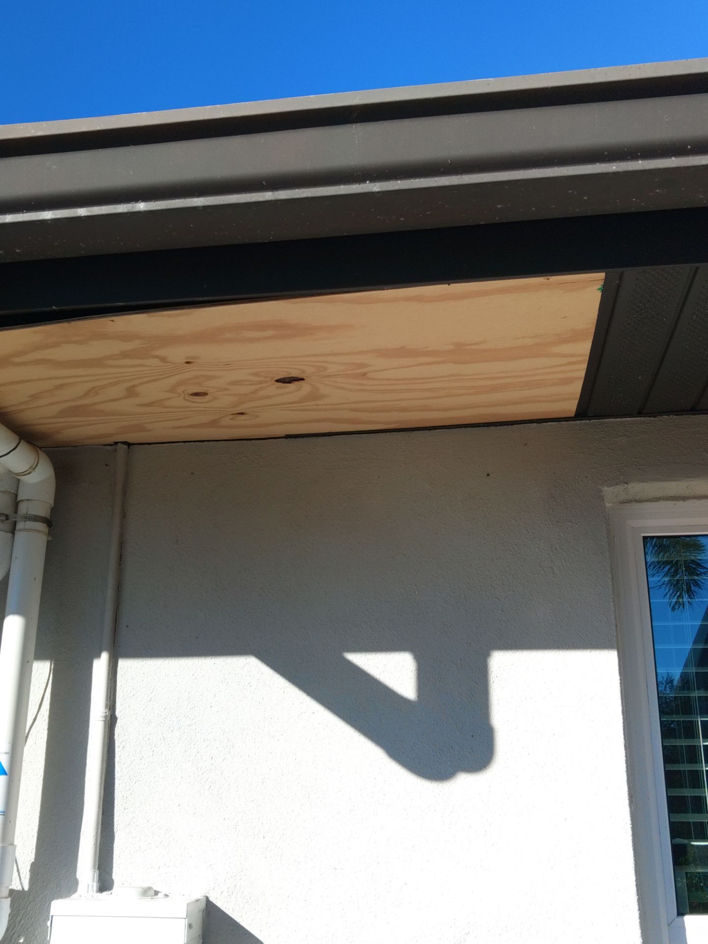 Dark Bronze Soffit Installation in Sarasota FL by Gutter Professors