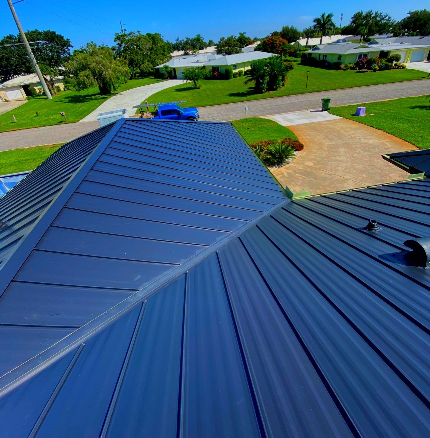 Metal Roofing System by Rooster Roofing, LLC