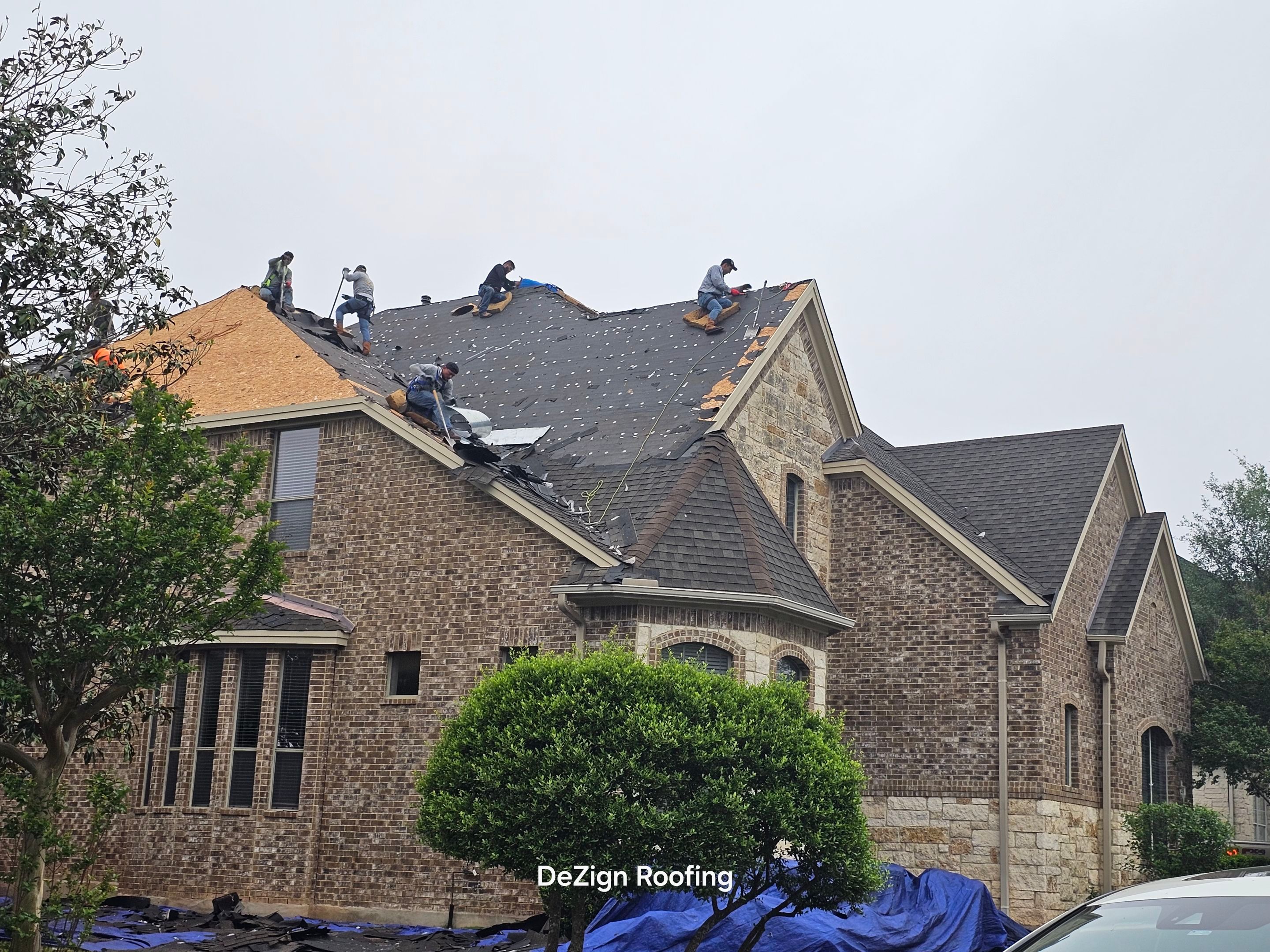 Residential Roofing Installation using Malarkey Vista Shingles Color Heather by DeZign Roofing & Exteriors