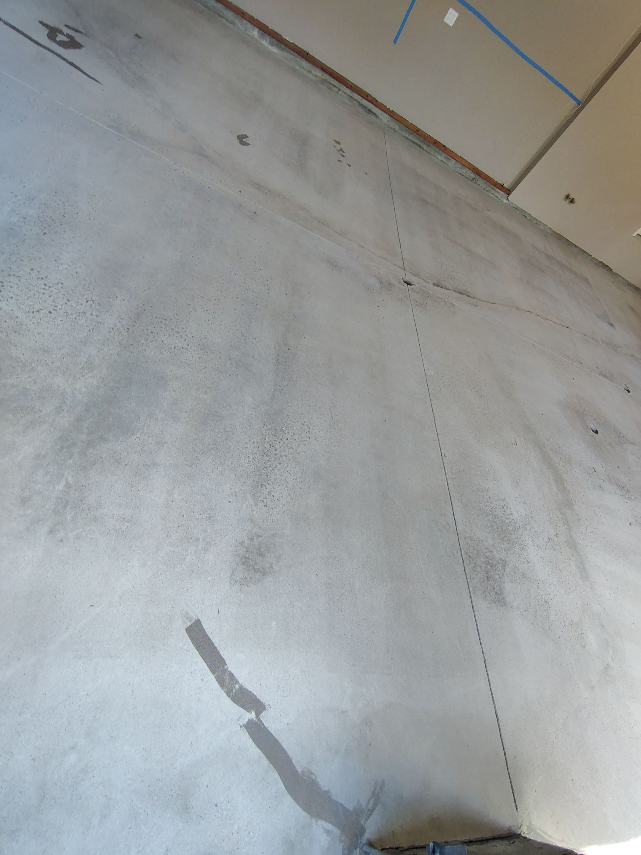 Sioux Falls Garage Concrete Repair and Epoxy Flake Floor Coating by Select Painting, Coatings & Garage Cabinets