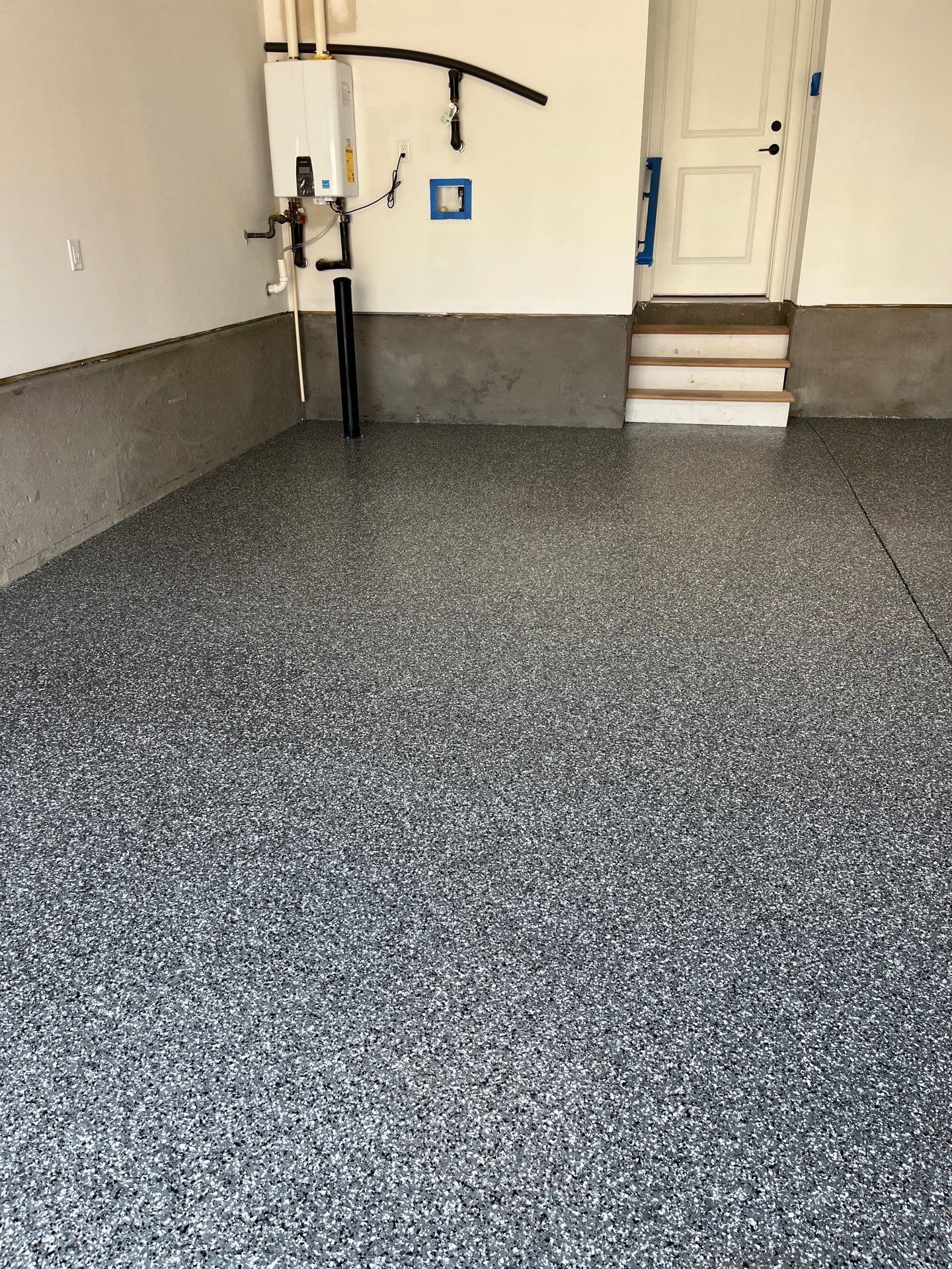 Garage Floor Coating using Wombat by My Garage Floor Guys