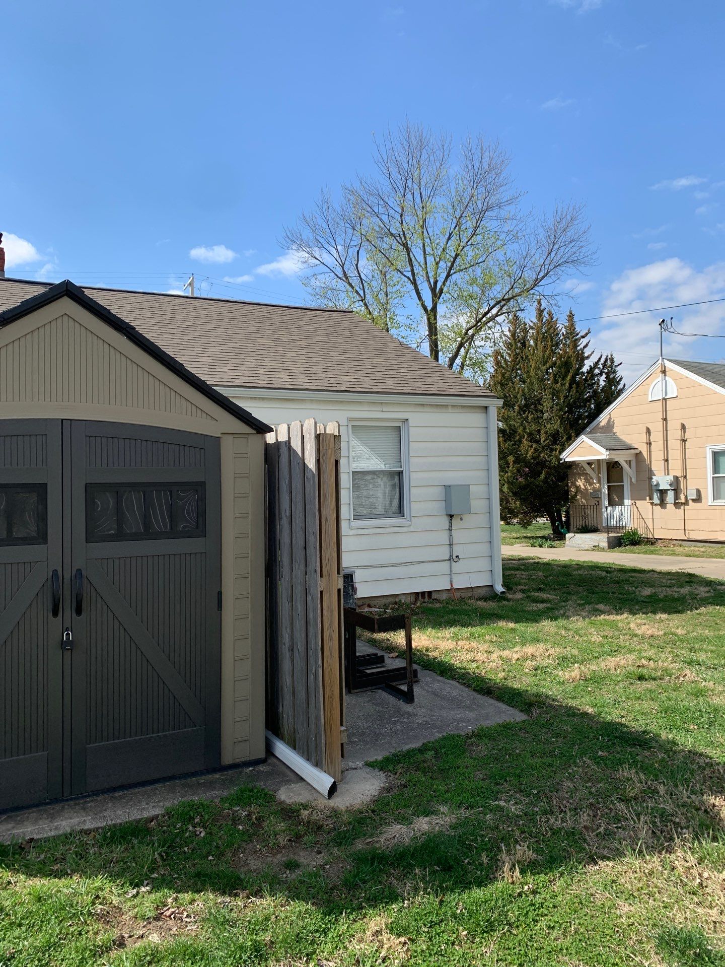 New Cypress Siding going on this North Kansas City Home  by EEC  Windows, Siding & Roofing 