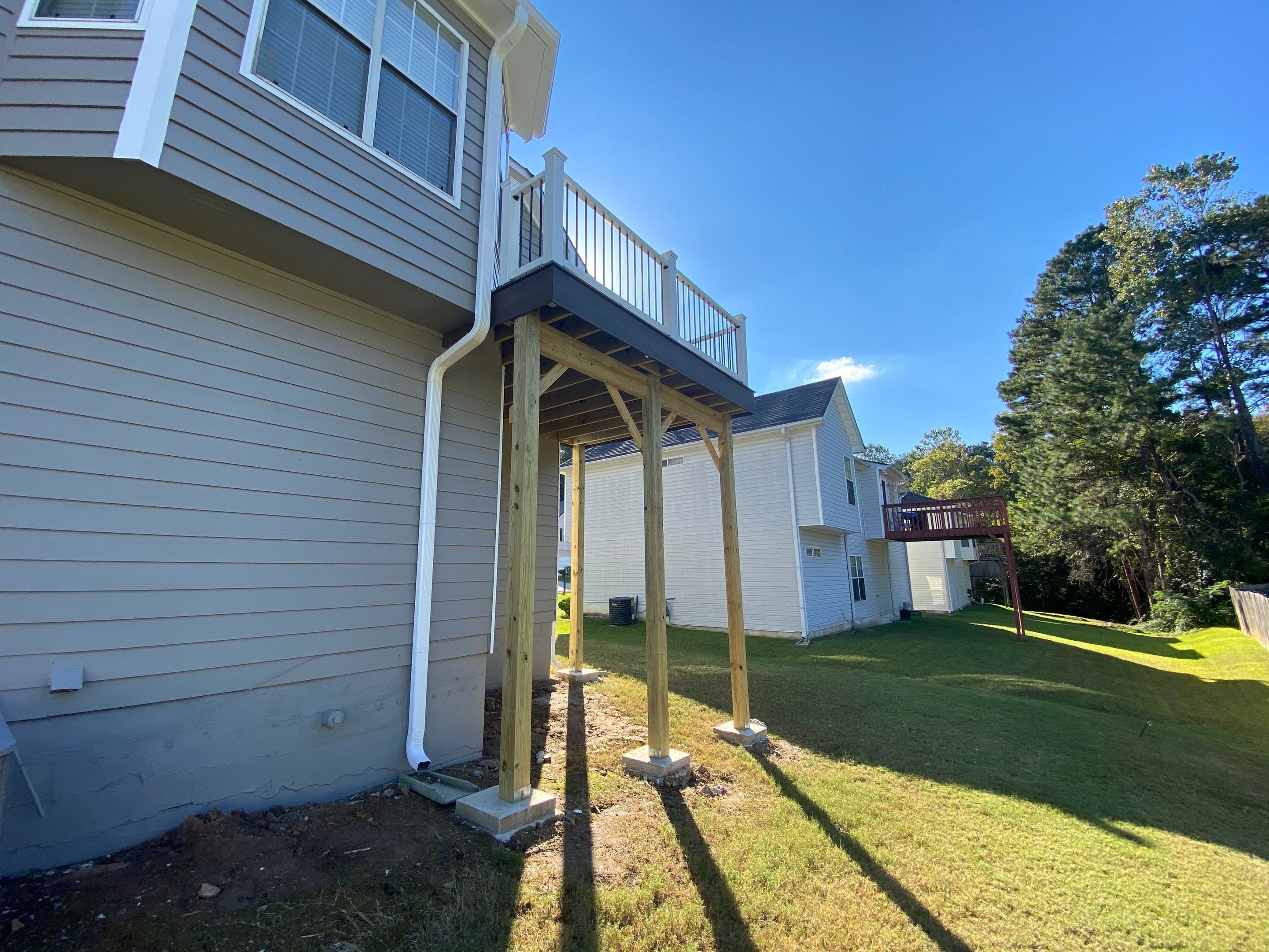 Elevated Wood Deck and Composite Step Replacement in Ellenwood by Swift Home Renovations 