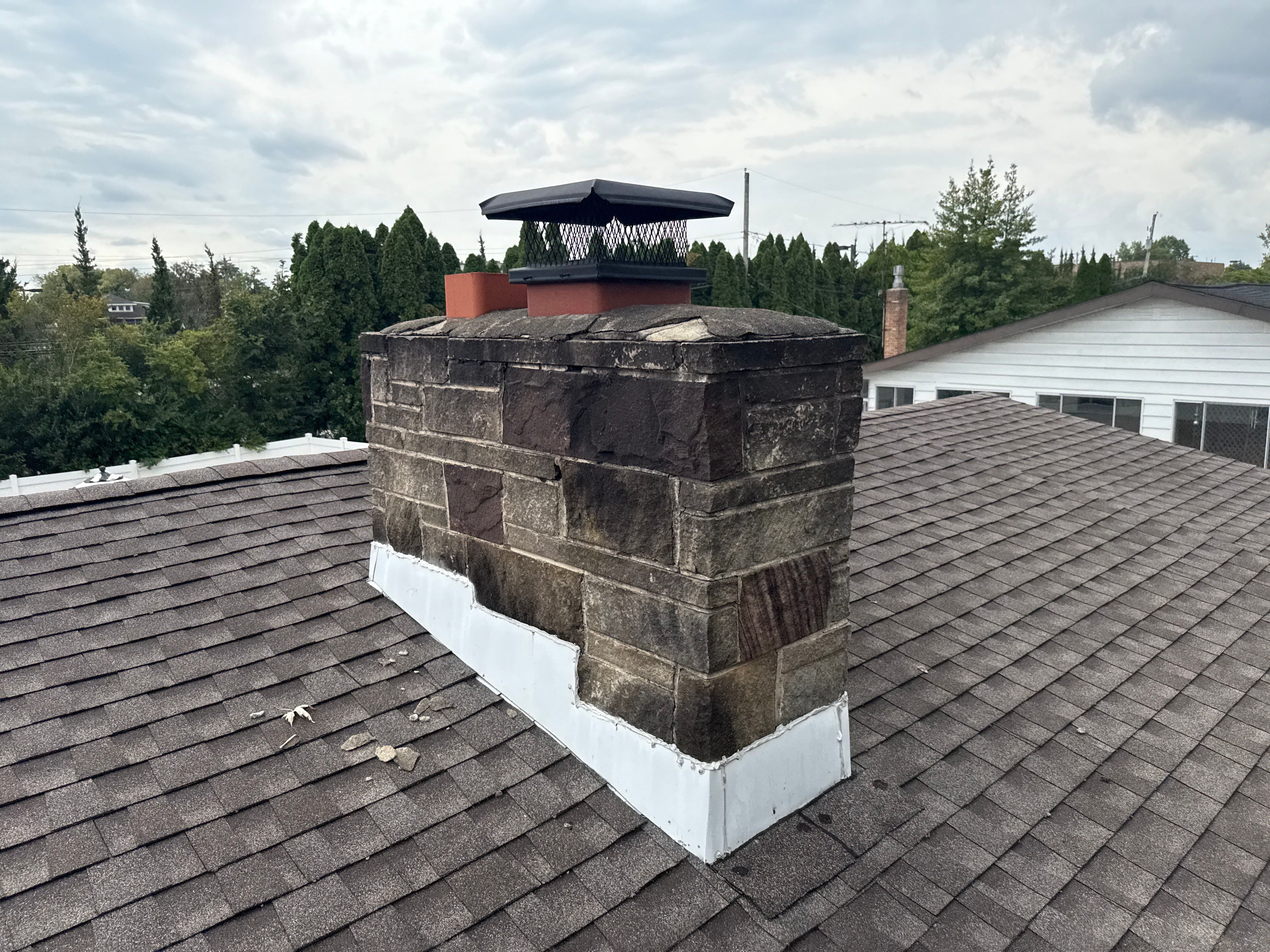Metal Roofing Installation and Stone Veneer Exterior Refresh in Camp Hill by Esh Builders