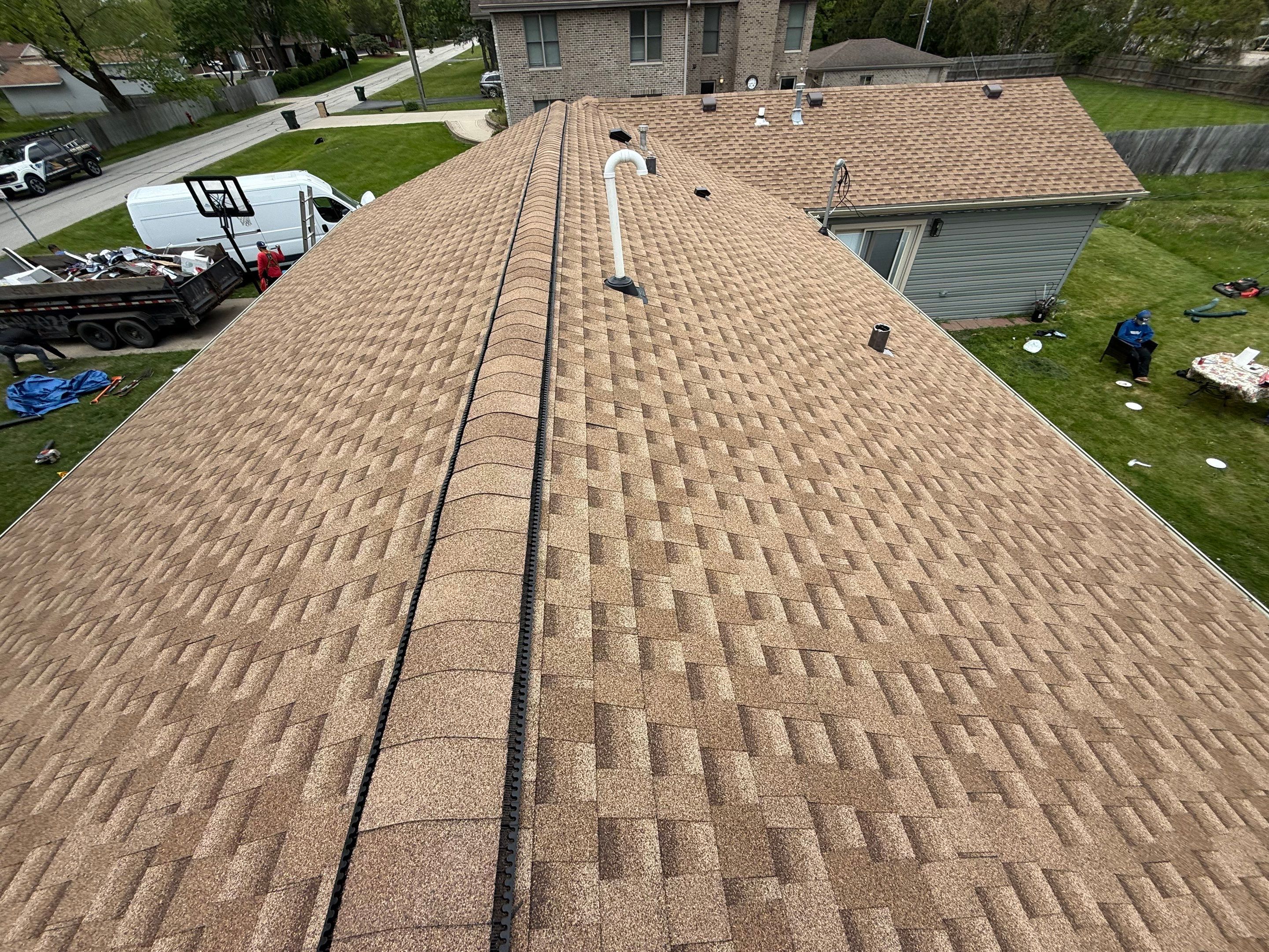 Roof replacement by Optimal Home Improvement 