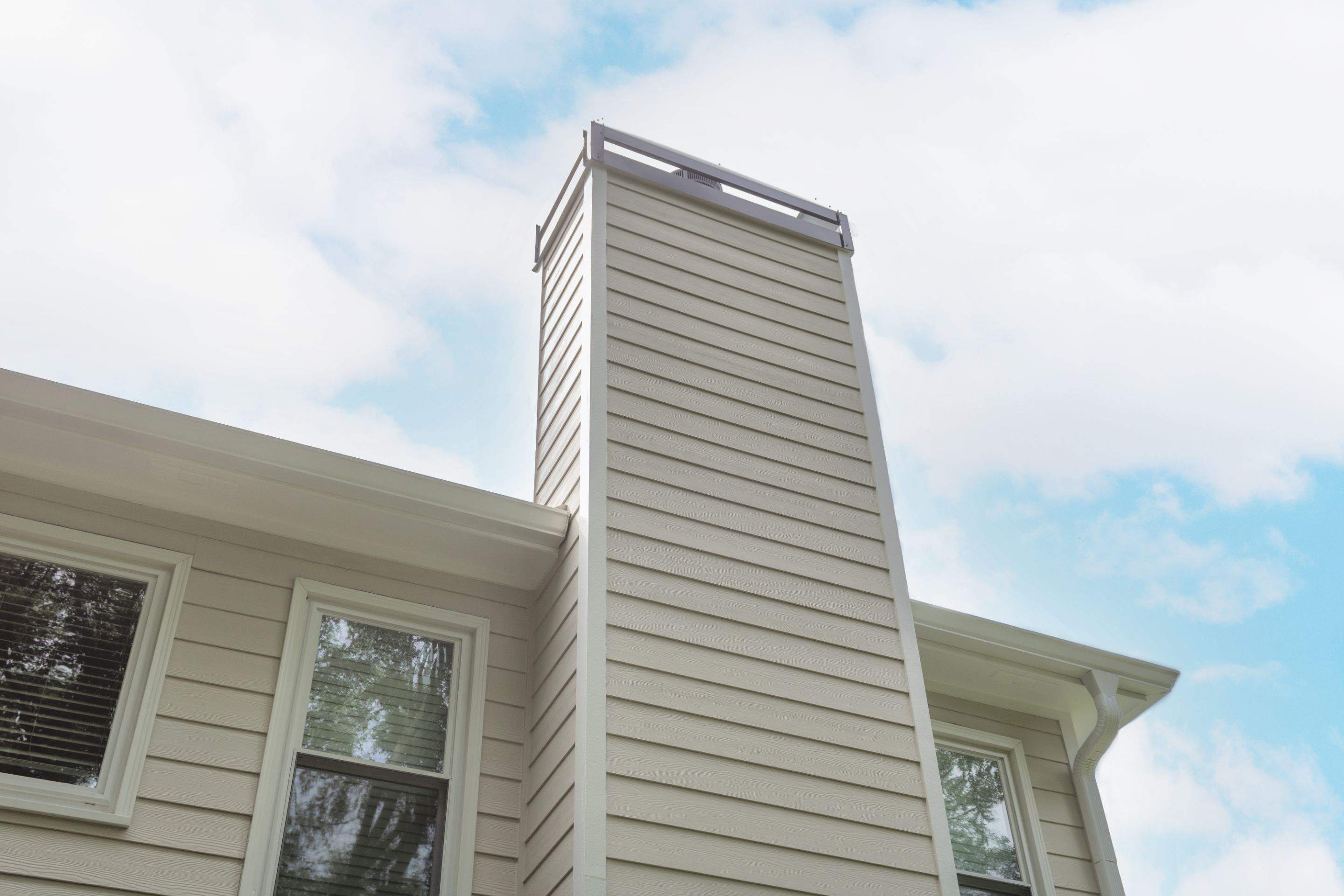 Marietta, GA Chimney Siding, Fascia, and Soffit Replacement using James Hardie Lap Siding, Hardie Trim, and Hardie Panel by Nelson Exteriors 