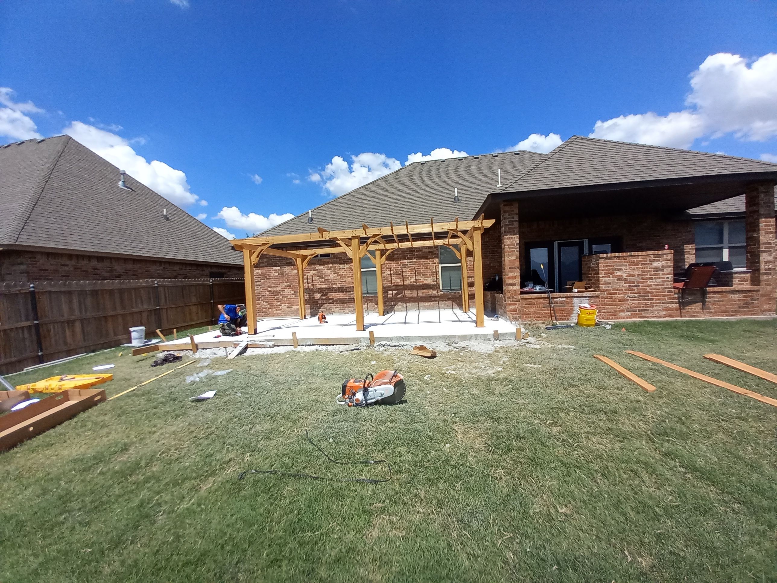 Concrete slab with Pergola by Clays Services Inc