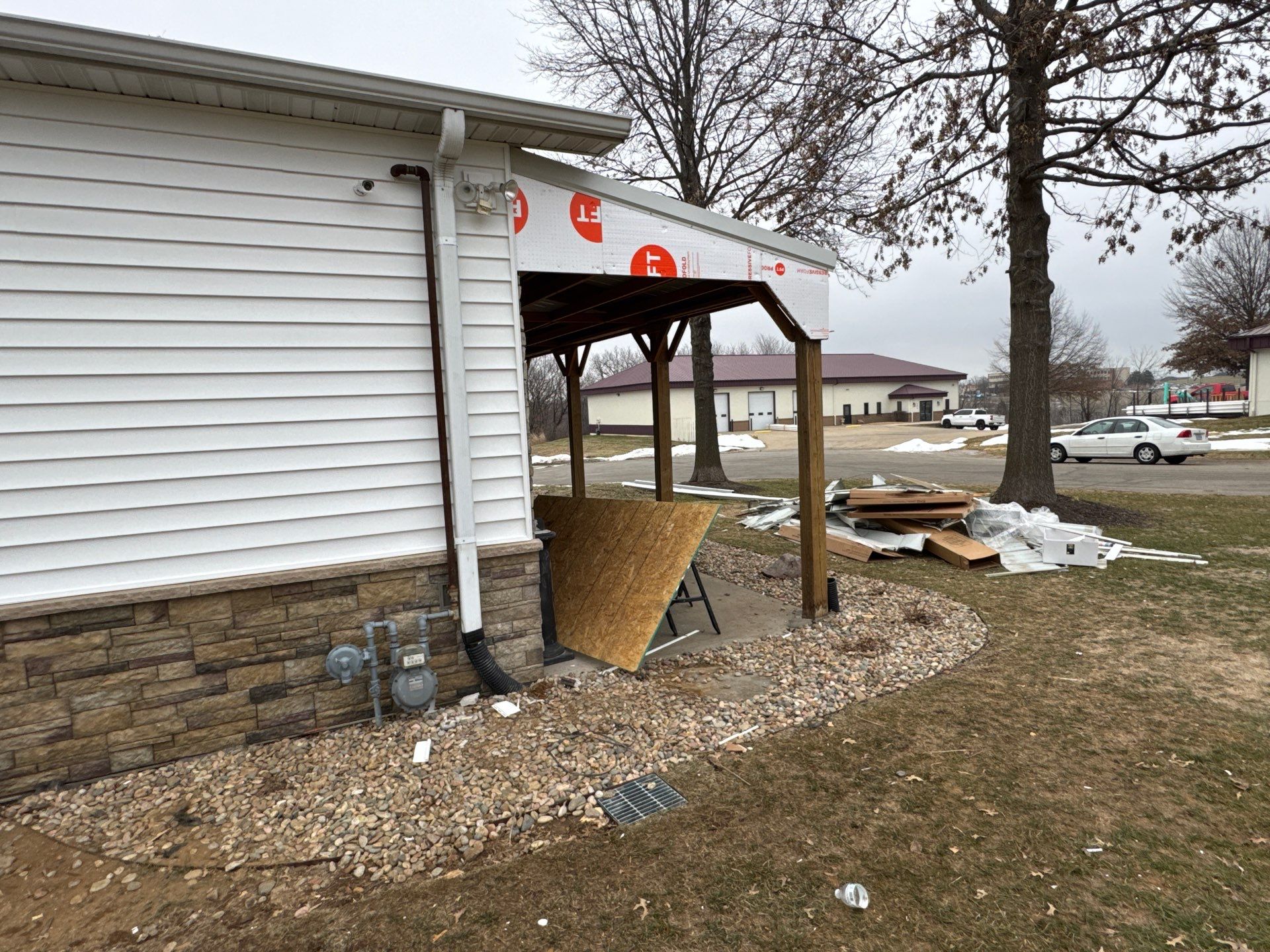 Siding and Stone Installation using Extrerior Porfolio Vinyl Siding and Versetta Stone by EEC  Windows, Siding & Roofing 