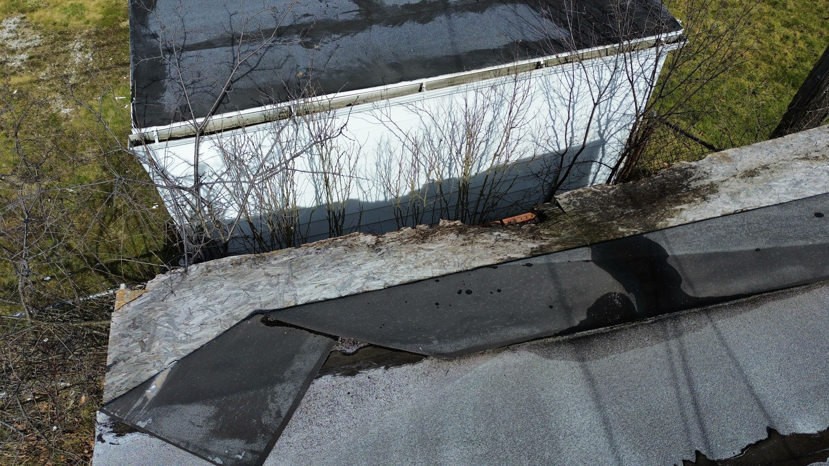 Detached Garage Roof and Decking Replacement by Atlas Roofing & Restoration