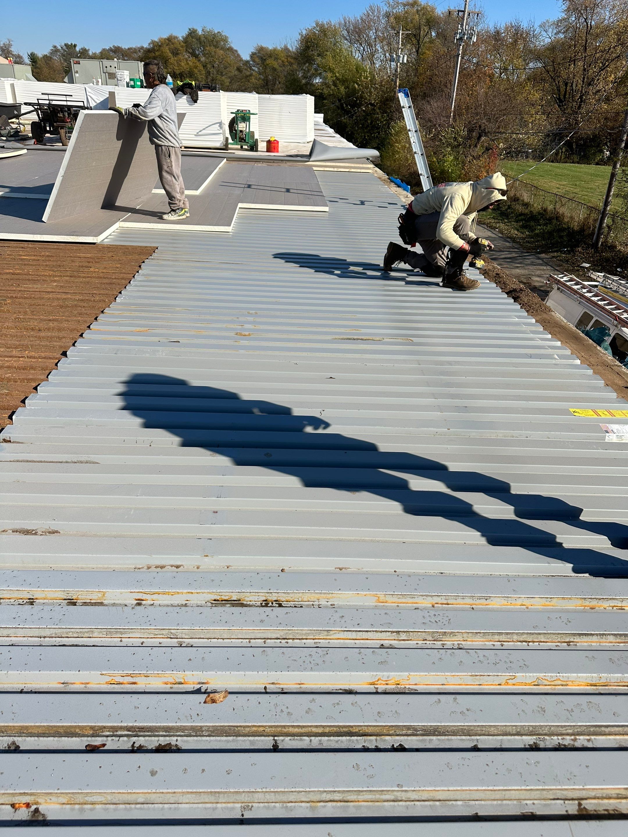 Commercial Flat Roof Replacement by Assured Restoration