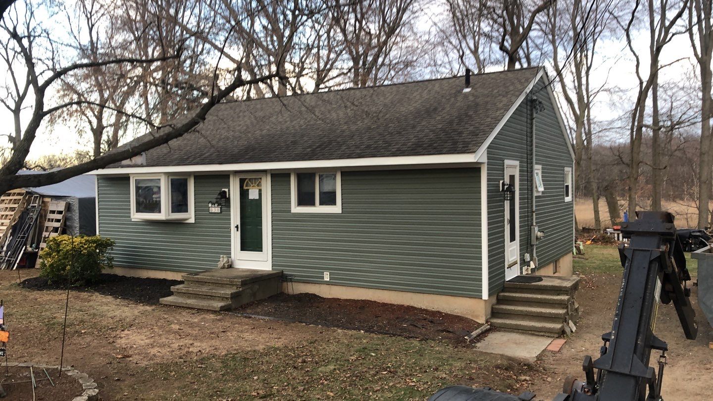 Siding Installation using Certainteed Mainstreet Forest Green by A Plus Exterior