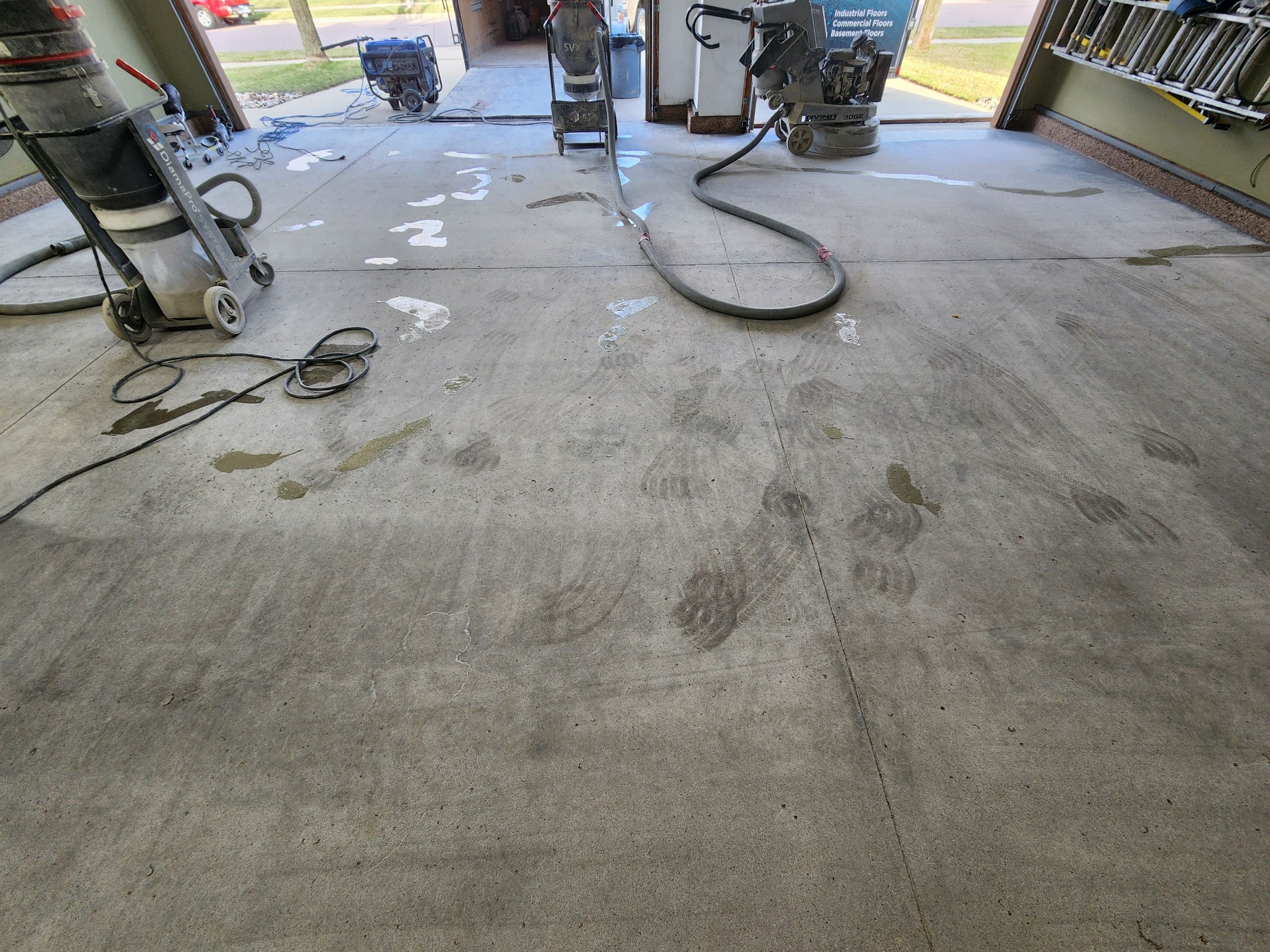 Sioux Falls Garage Floor Concrete Coating with Textured Aggregate by Select Painting, Coatings & Garage Cabinets