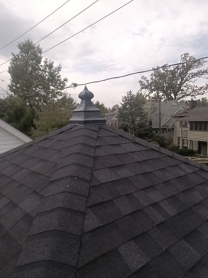 Residential Roofing Installation, Dec-tek walk-out porch roof, siding on garage by Absolute Roofing and Construction