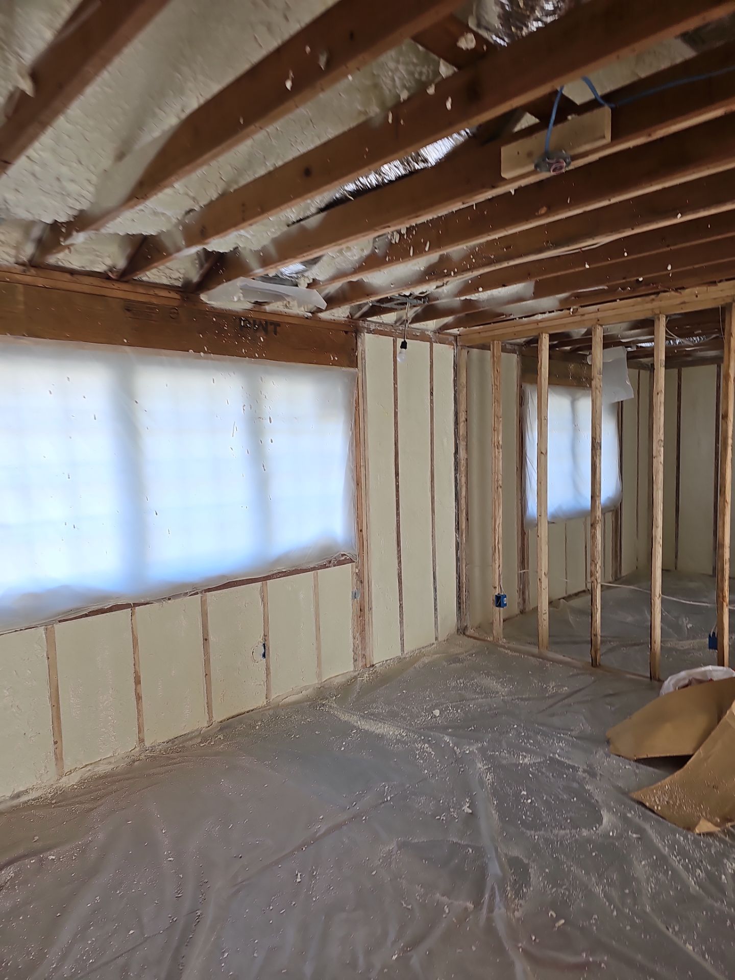 Basement Exterior Walls using Closed Cell Spray Foam by NYS Foam & Energy