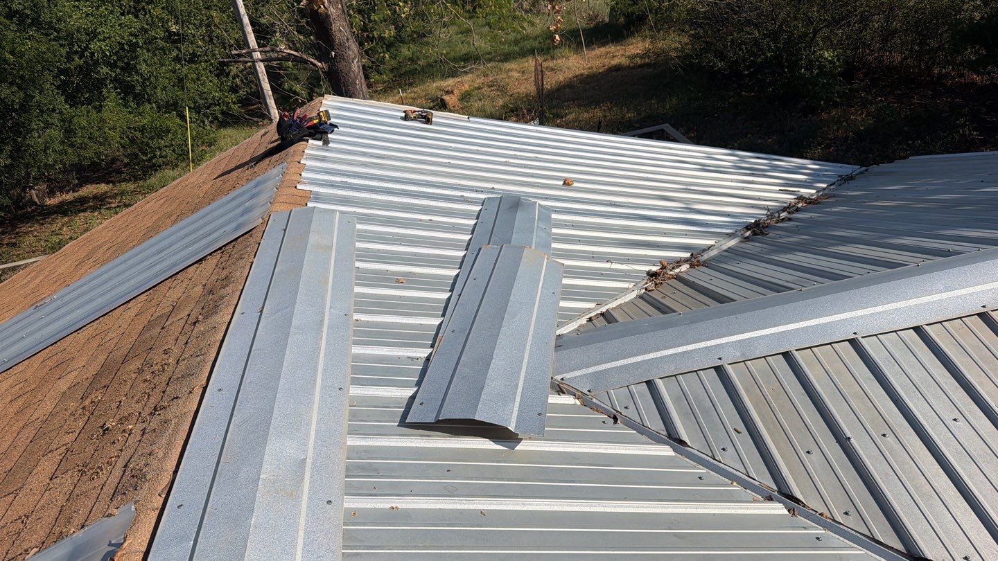 Corrugated Metal Roof Repair for Brick Home in Lindsay by BANA Roofing and Solar Supply