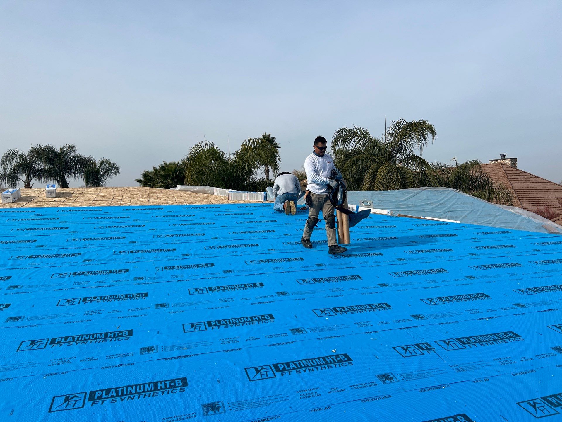 Tile, Metal, and TPO roofing project (new construction) by Straight Edge Roofing Inc