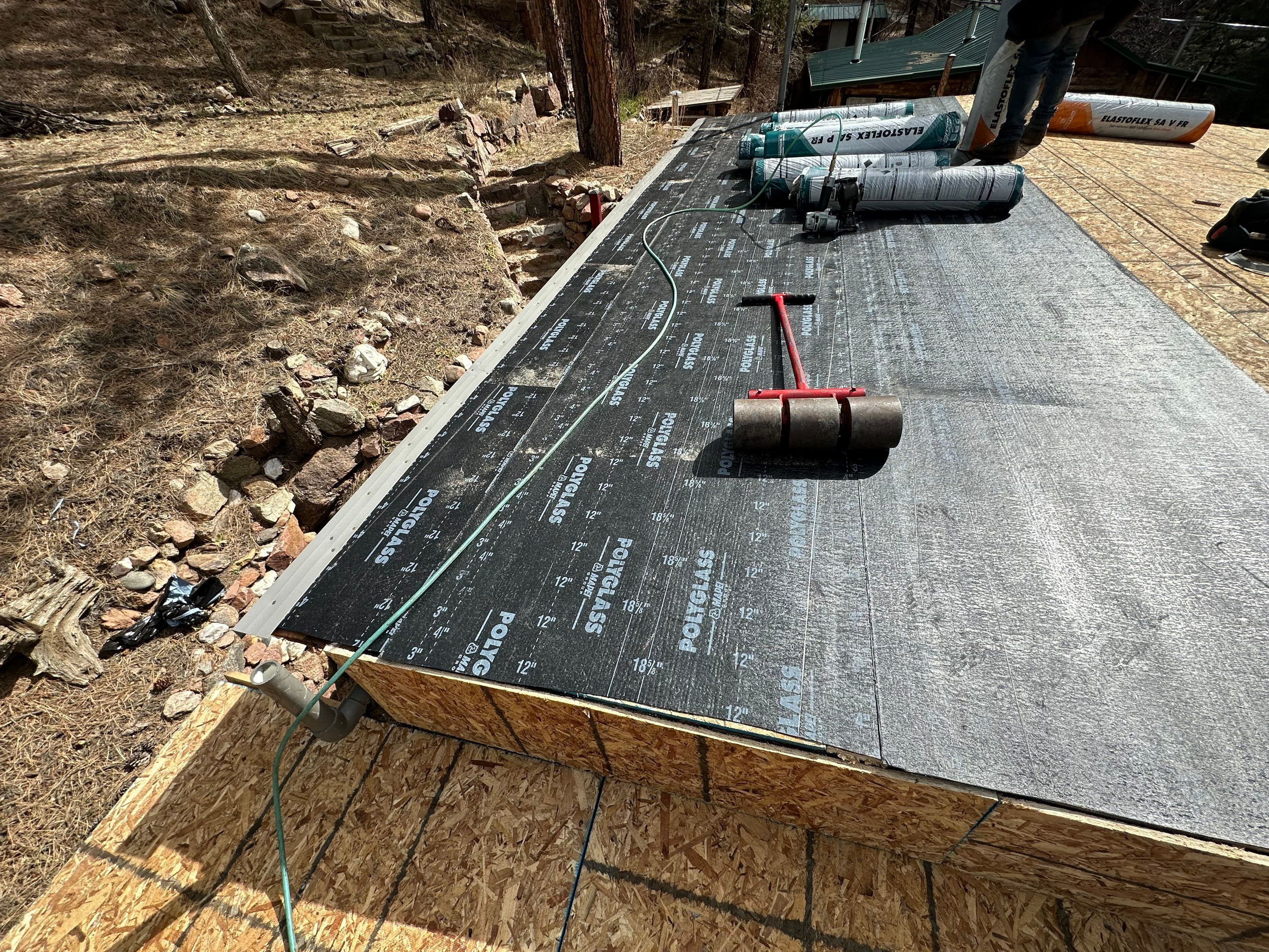 Residential Roofing Installation using Modified Bitumen Roofing by Blue Peaks Roofing LLC 