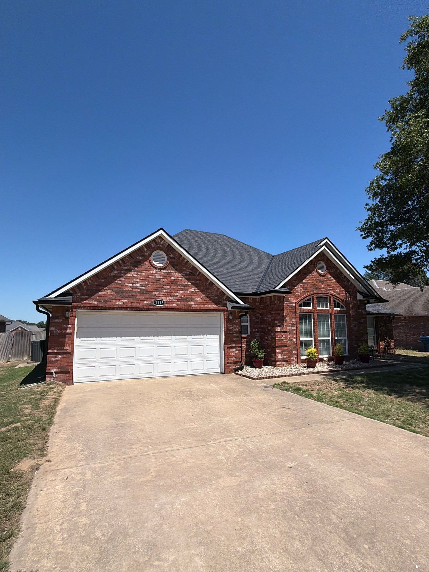 Black roof & gutters!! by In & Out Construction & Remodeling, LLC