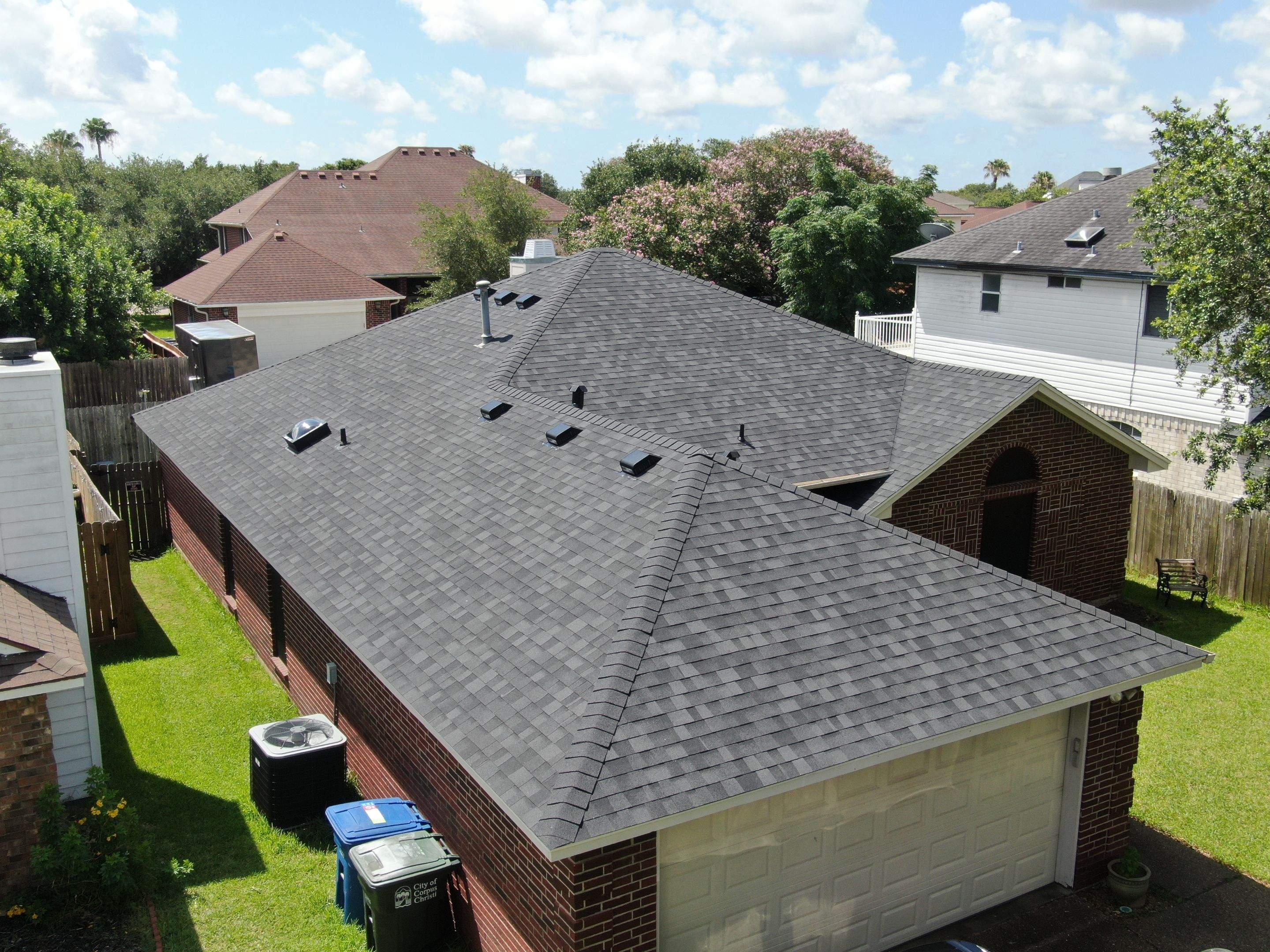 Nothing looks nicer than a little black roof by Bayfront Roofing and Construction