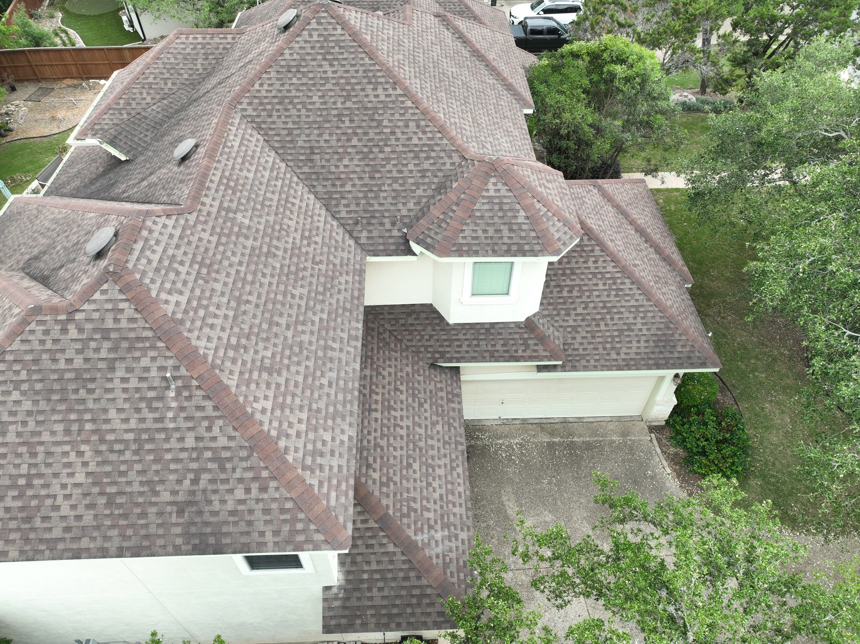 Residential Roof Replacement using 30 Year Laminate Shingles with High Profile Ridge by Premier Roofing and Contracting