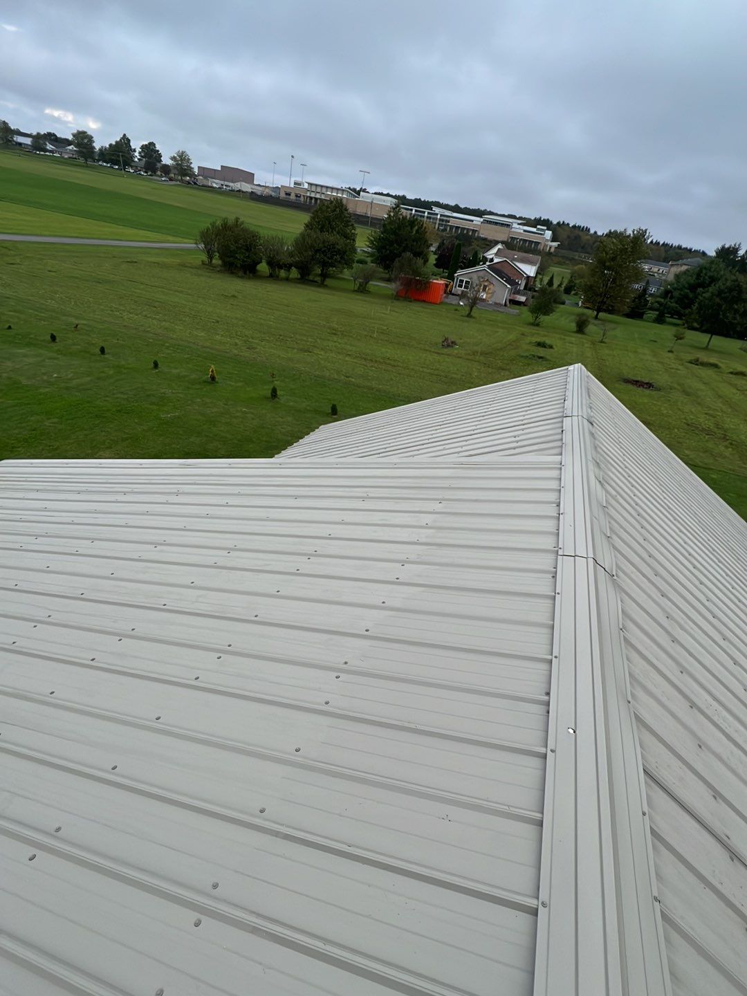 Light Stone Exposed Fastener by Reimagine Roofing
