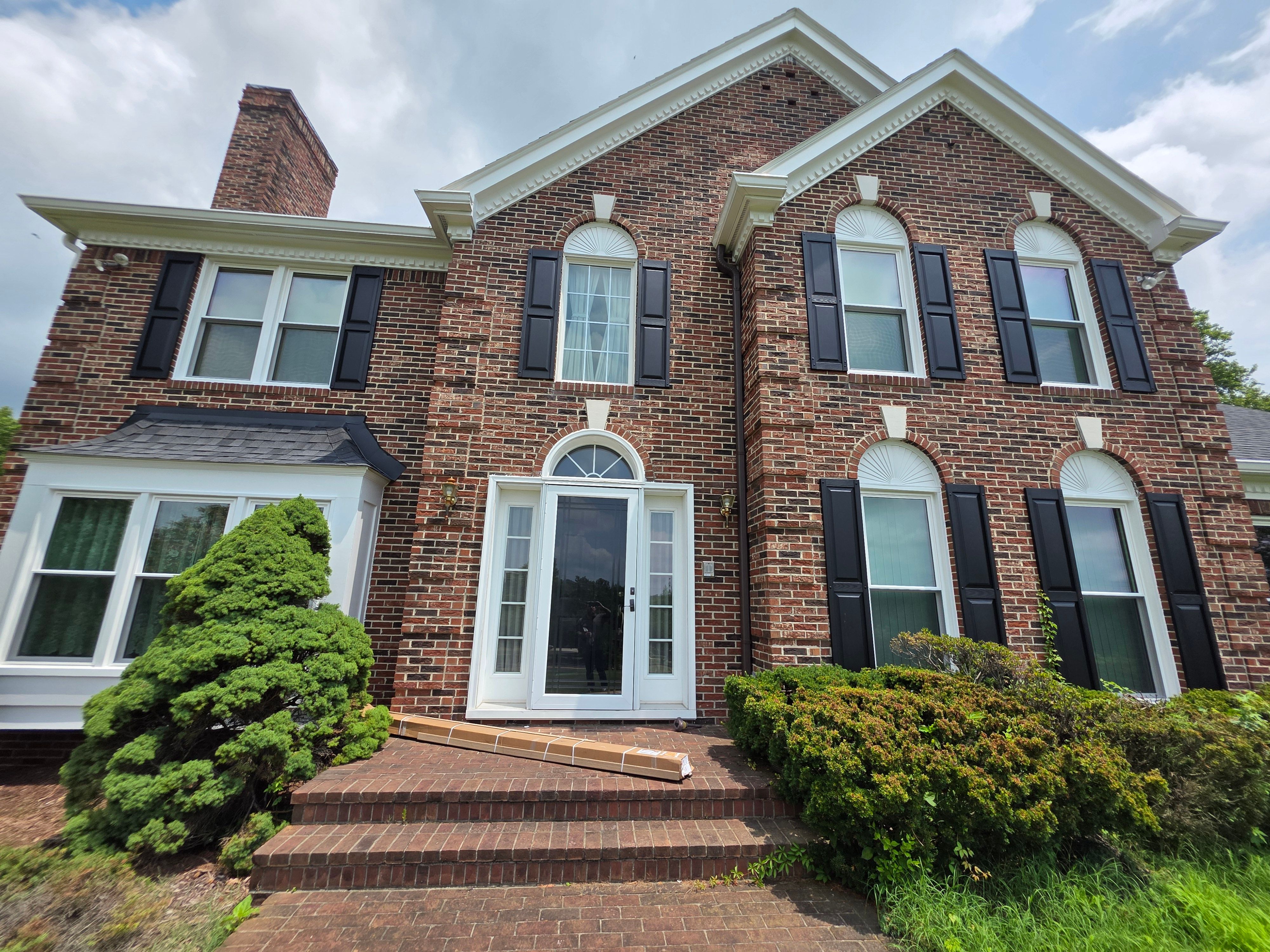 Vinyl Window Replacement for Two-Story Brick Home in Upper Marlboro by Window Depot of Annapolis