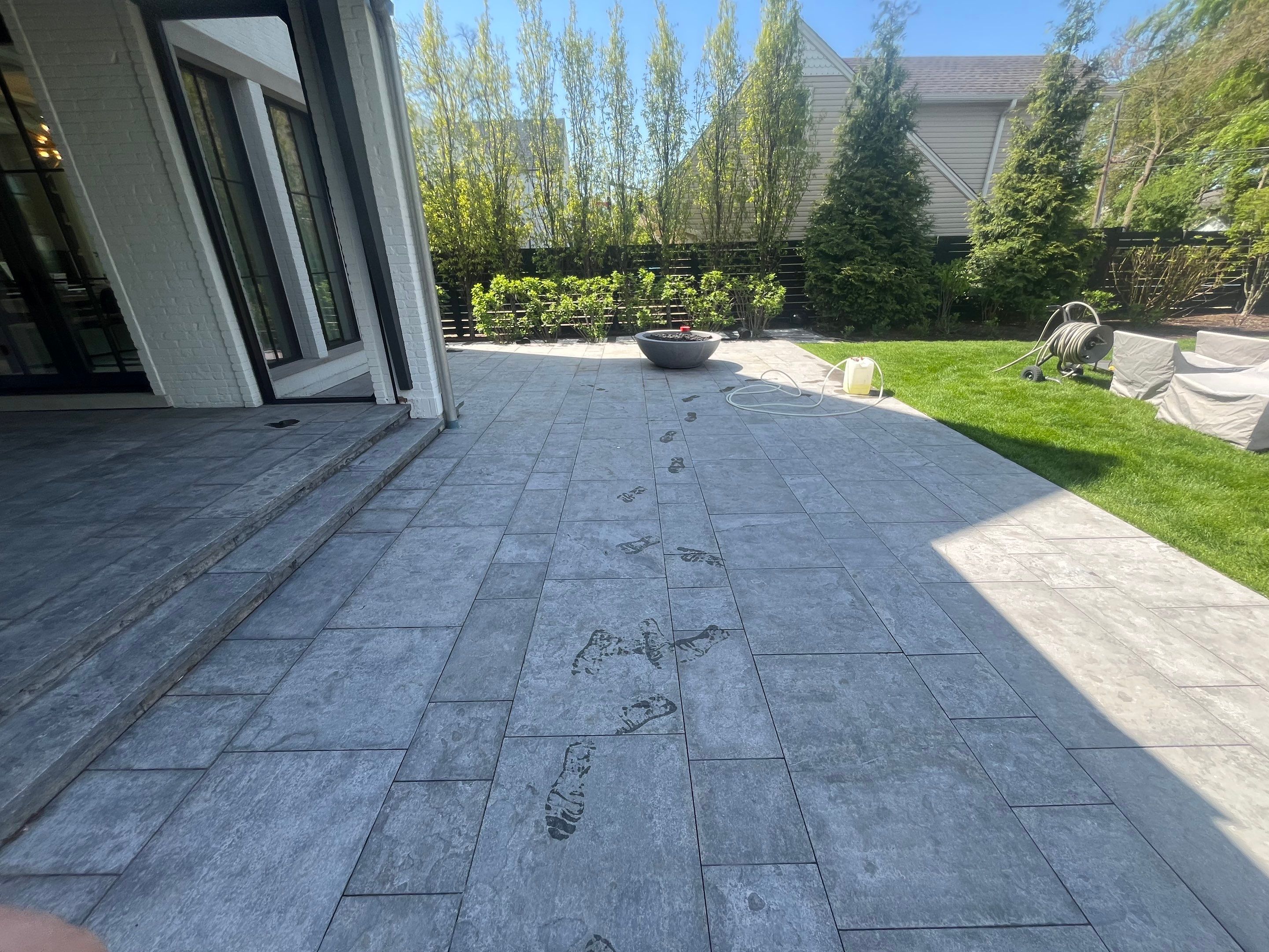Exterior Stone and Garage Pressure Washing by Northern Power Washing LLC.