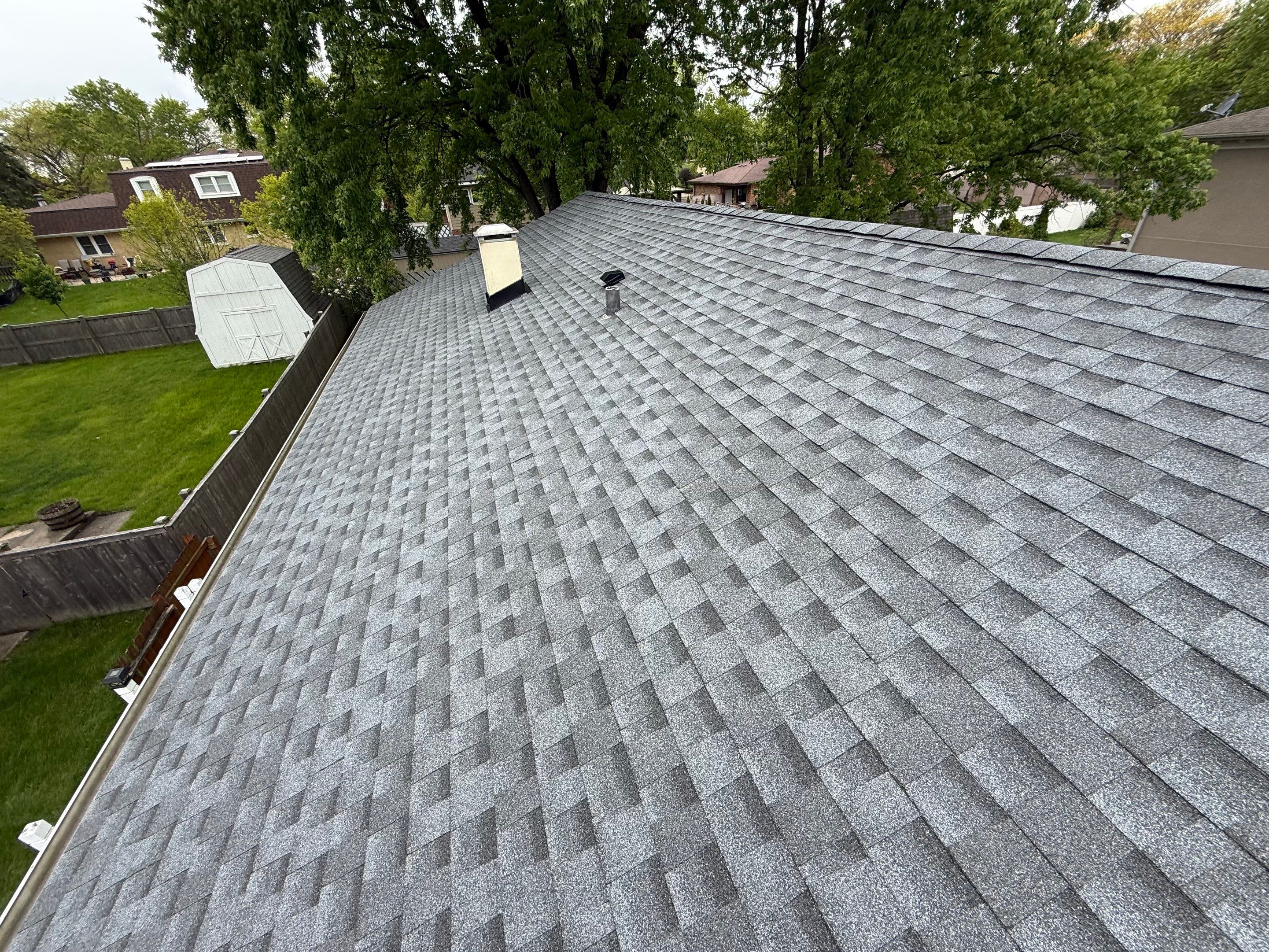 Roof replacement and chimney flashing by Optimal Home Improvement 