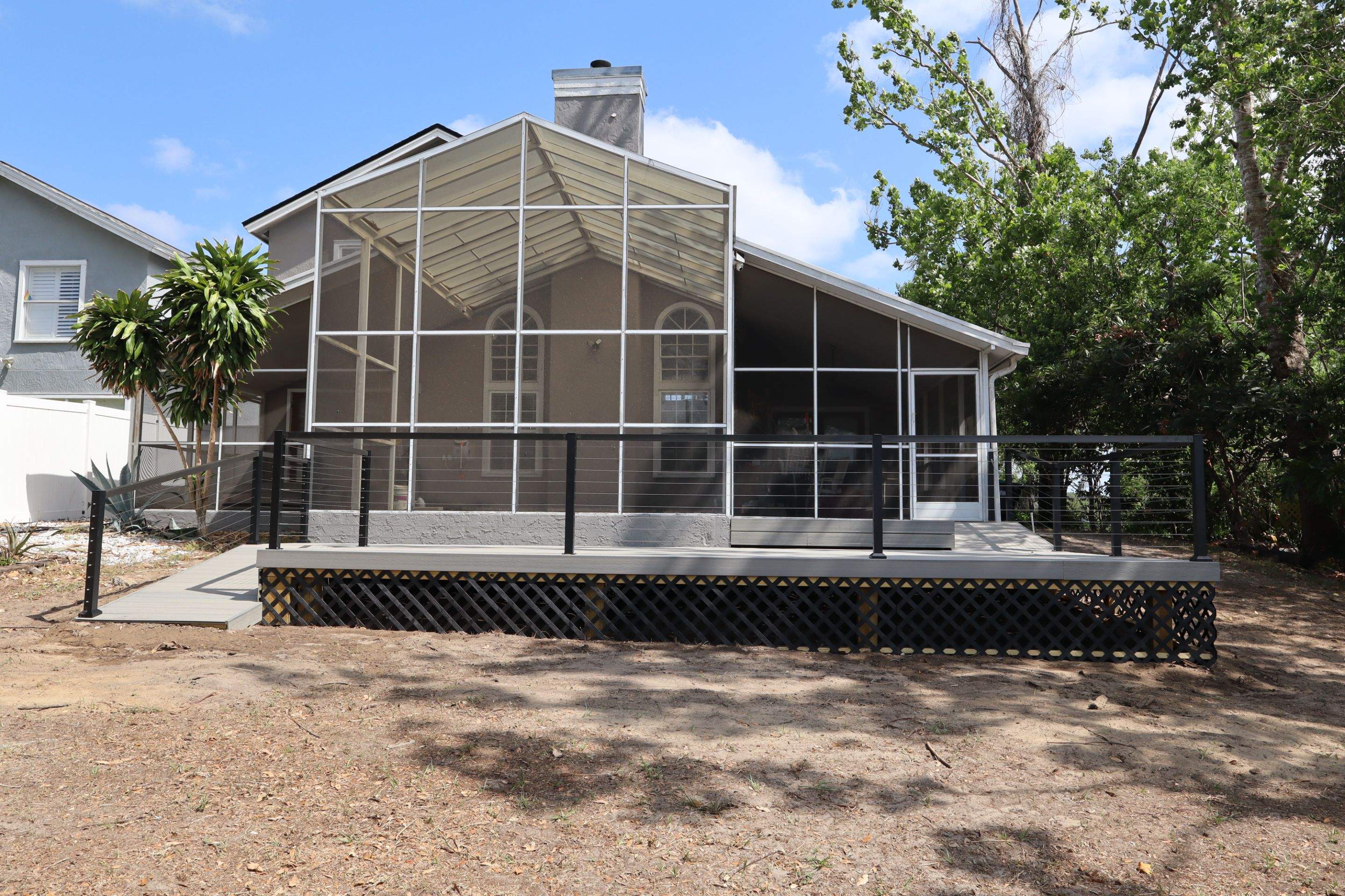Composite deck and aluminum railings by Orlando pergolas