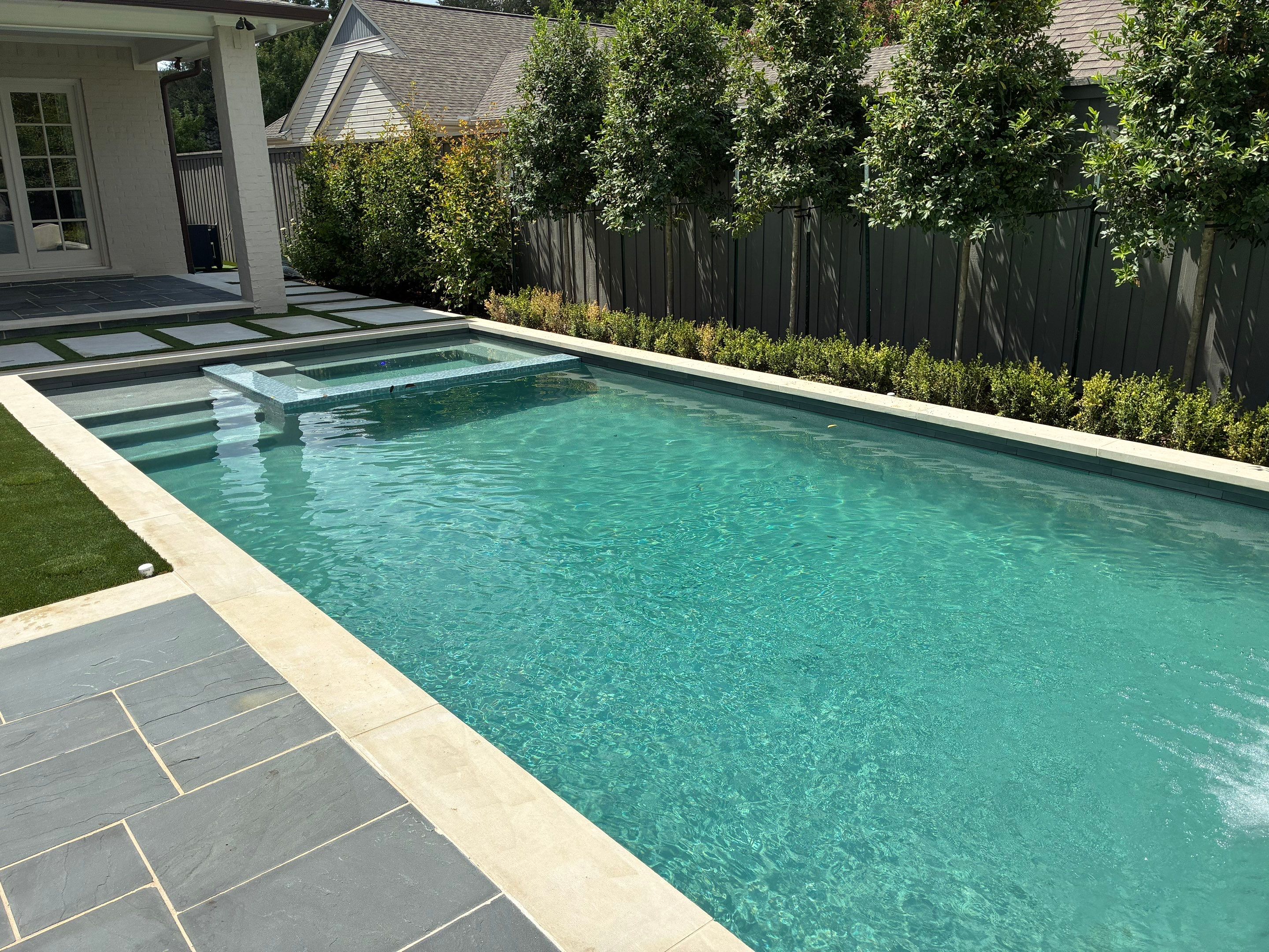 Custom Swimming Pool and Flagstone Patio Installation in Dallas by Hobert Pools