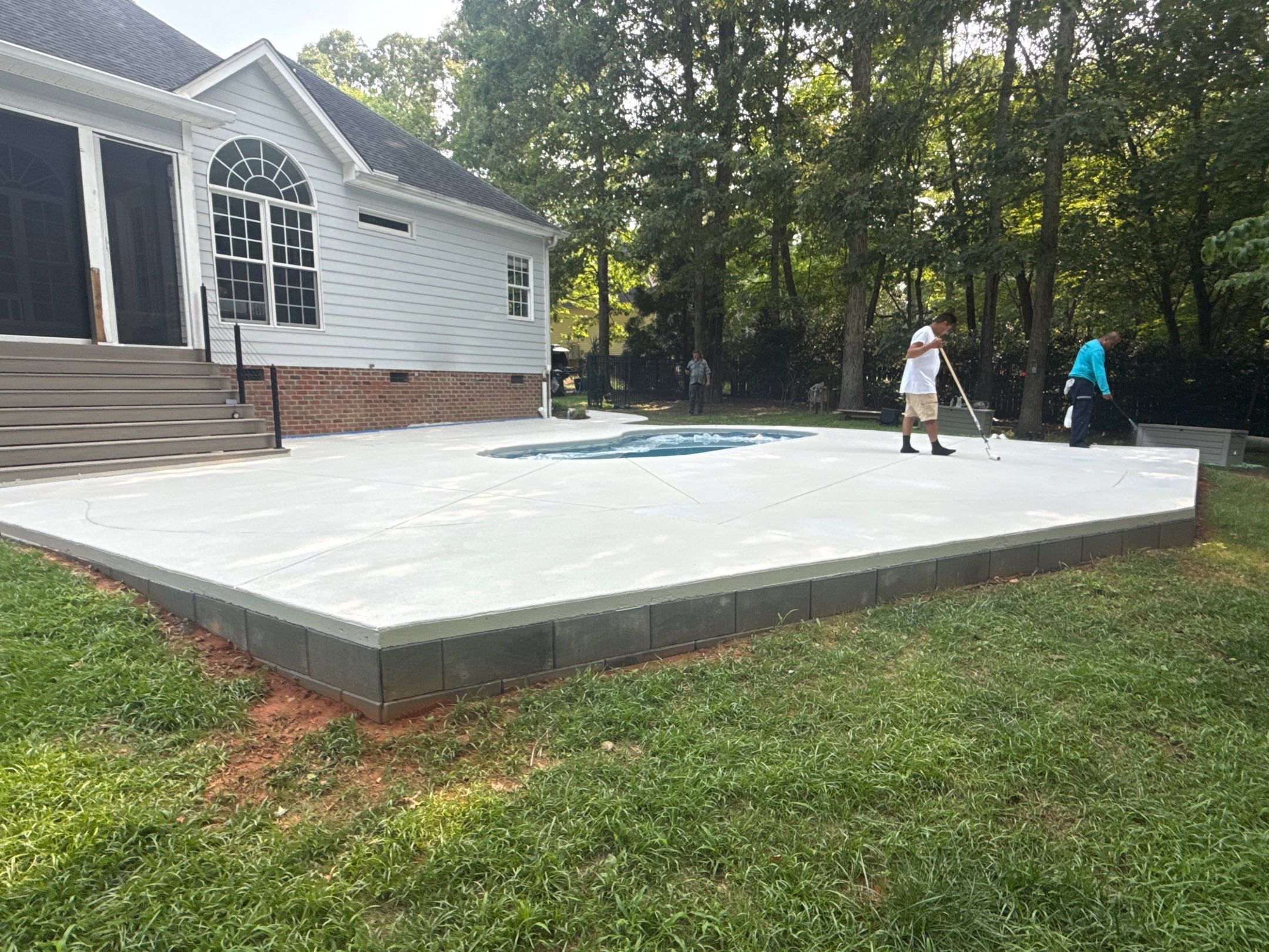 Cool decking pool in Youngsville by Martinez Brother’s Nc Landscaping Inc