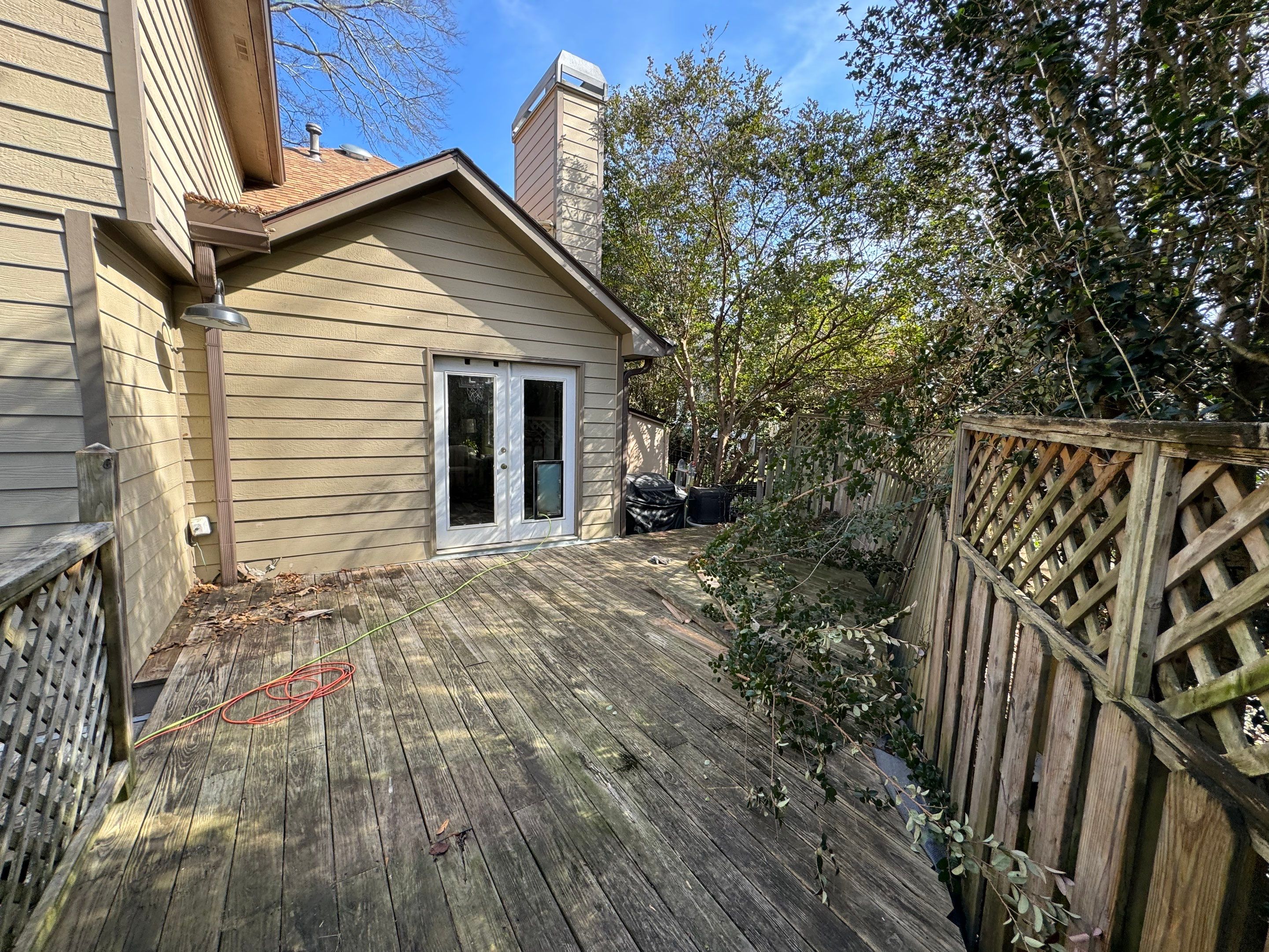 Custom Screened Porch Addition with Vaulted Wood Ceiling in Decatur by Swift Home Renovations