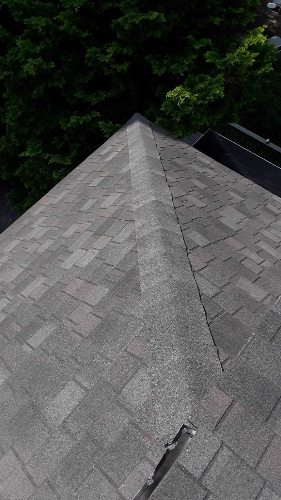 Skylight, Roof, and Gutter Replacement by American Home Contractors