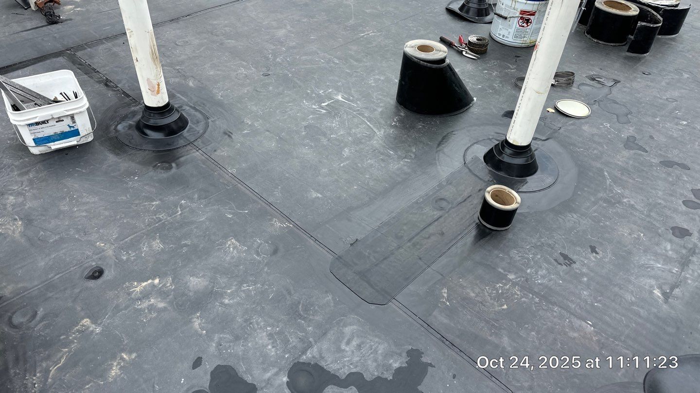 Westford EPDM Flat Roof with Gutter & Soffit/Fascia Replacement by Mighty Dog Roofing of Greater Middlesex County