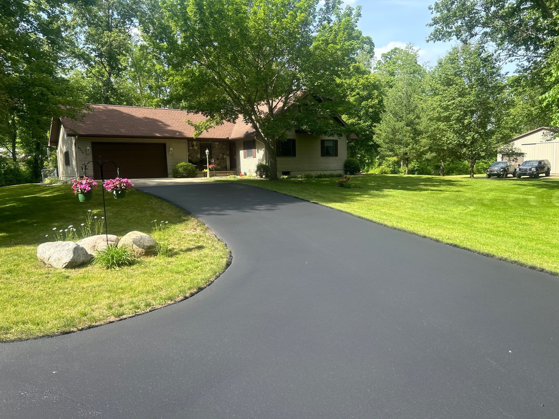 High end residential driveway by Quality Asphalt & Maintenance LLC