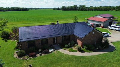 Residential Roofing Installation using Perfromance Panel Metal - Black