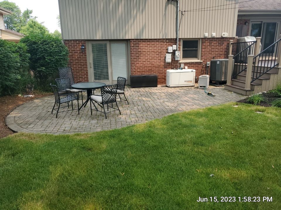 Brick paver clean, sand and seal. using Algaecide, soft wash soap by Northern Power Washing LLC.