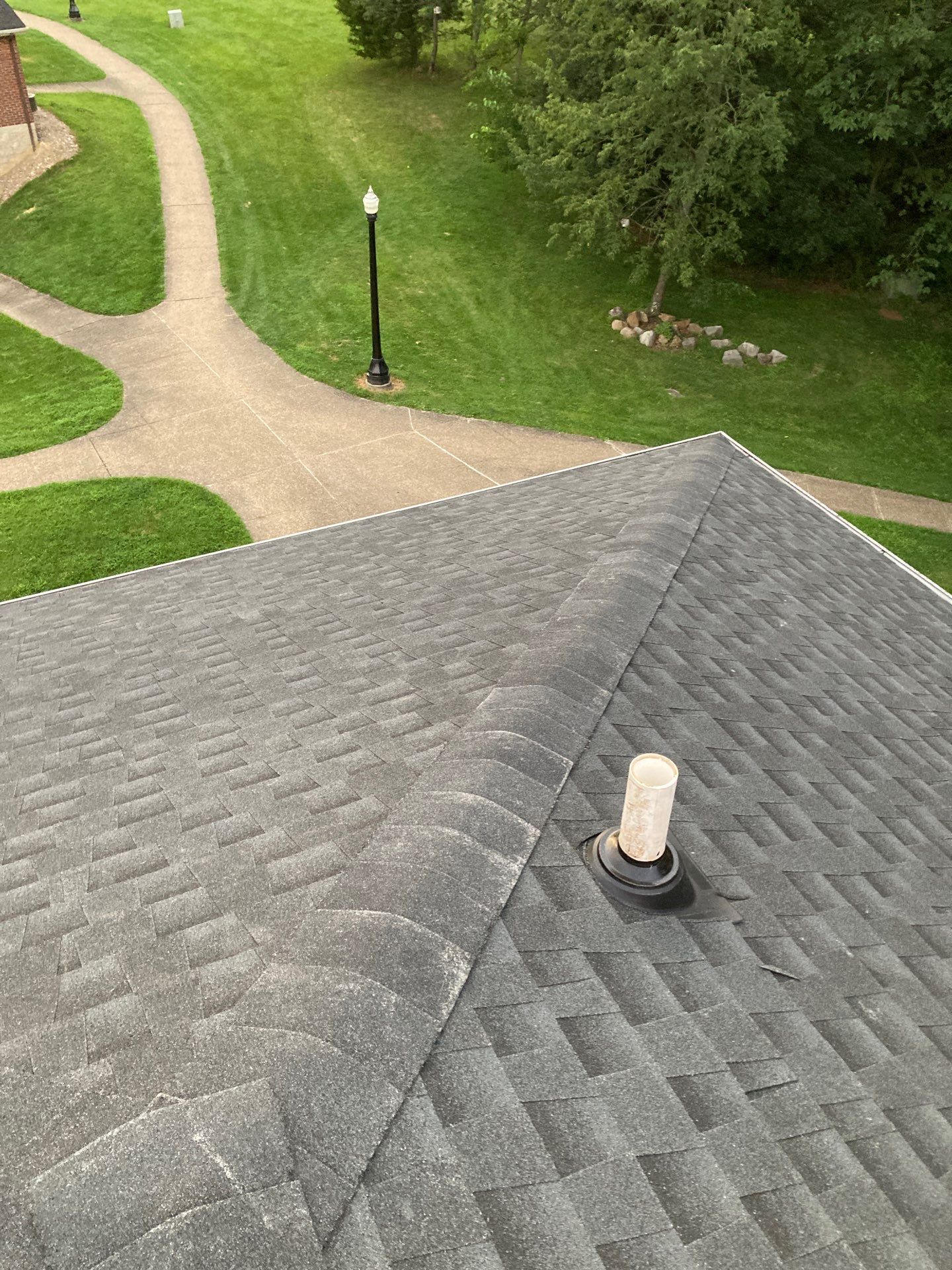 Commercial Roofing Installation using GAF Timberline HDZ Charcoal by Rainstoppers Roofing