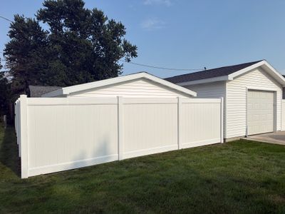 White Vinyl Privacy Fence Installation and Side Yard Upgrades in Waterloo