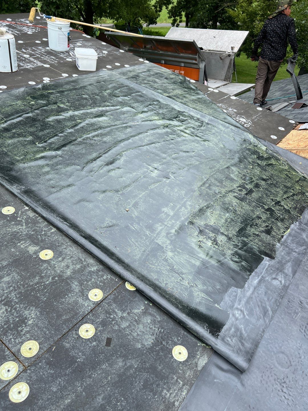 Residential Roofing Installation using 60 mil rubber roof  by Nitro Roofing and Construction