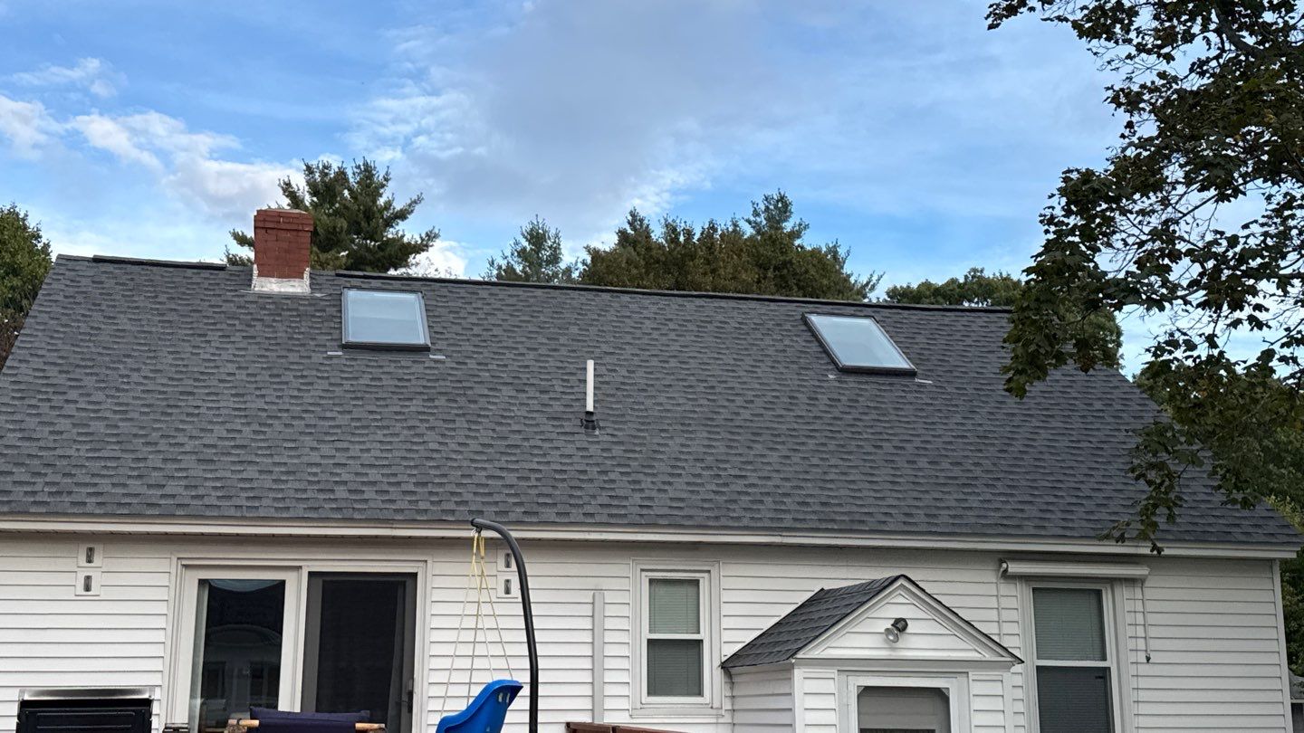 Complete Roof Replacement with GAF Pewter Gray HDZ™ Shingles, VELUX Skylights & New Gutters by Sensible Home Solutions
